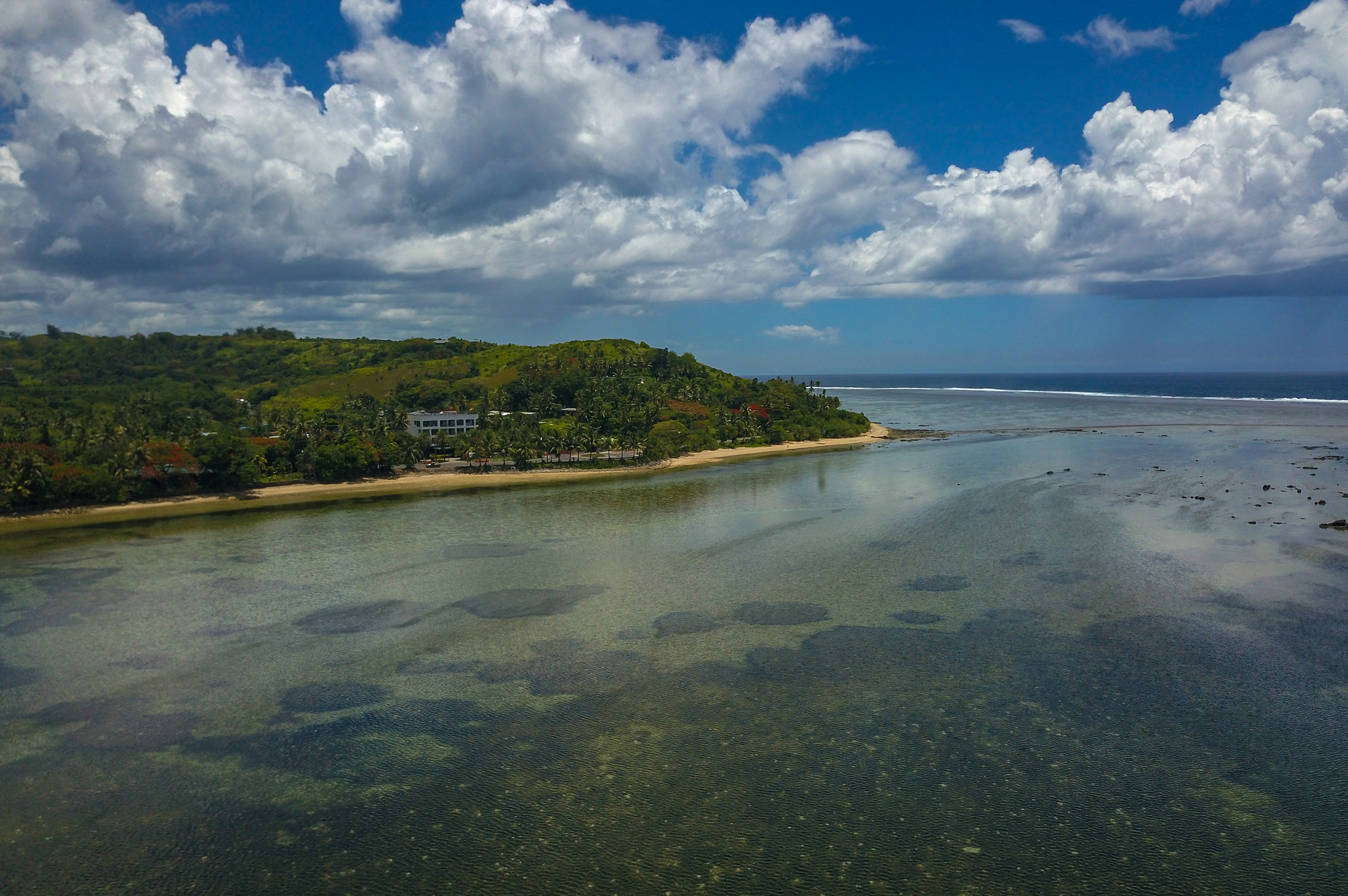 This picture taken on December 21, 2022 shows an aerial view of the shoreline close to a resort on the outskirts of Suva, the capital of Fiji