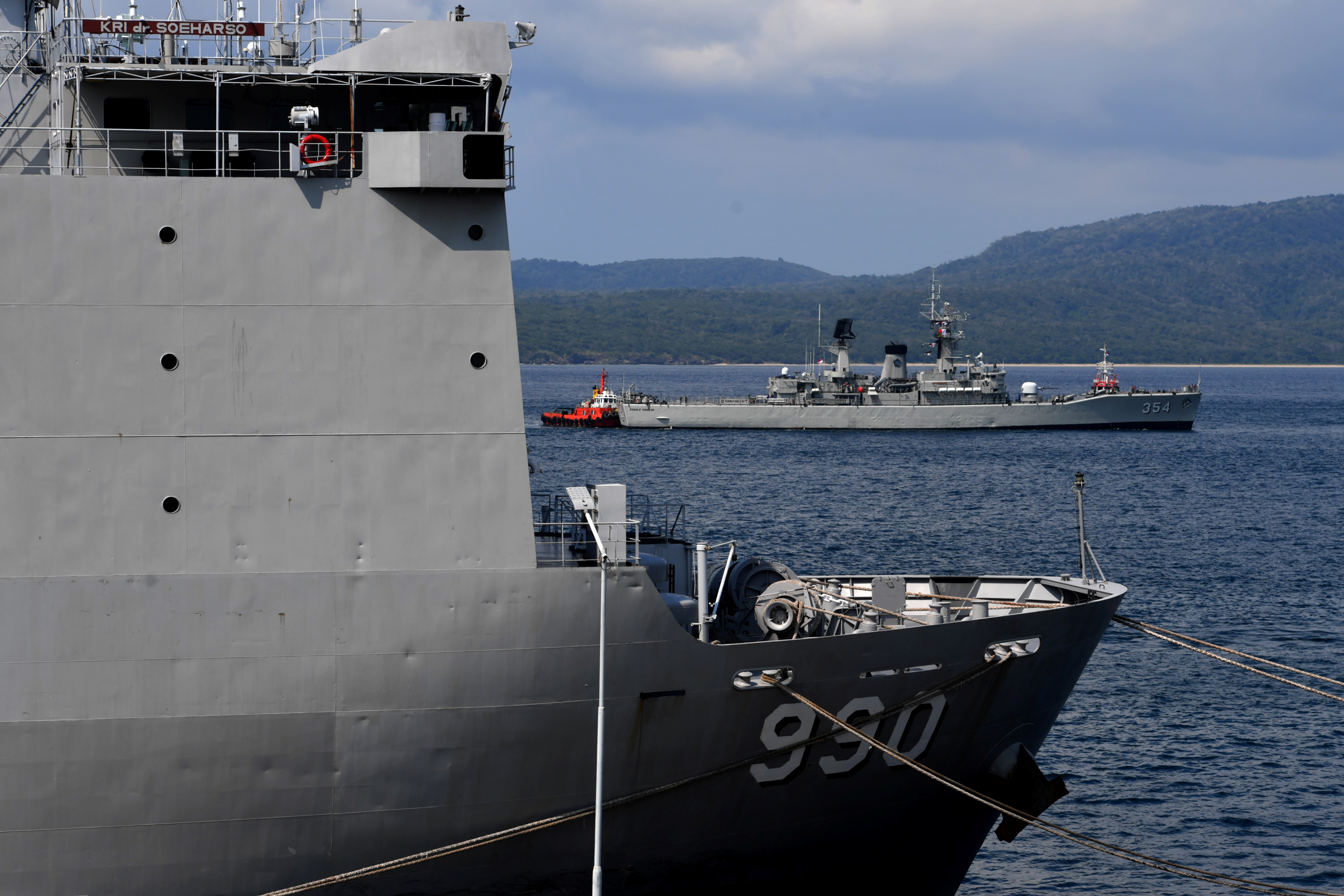 Indonesian Navy ships are seen at the Tanjung Wangi port as the search continues for the sunken KRI Nanggala-402 submarine in Banyuwangi, East Java Province, Indonesia April 26, 2021, in this photo taken by Antara Foto/Zabur Karuru/via Reuters. ATTENTION EDITORS - THIS IMAGE WAS PROVIDED BY THIRD PARTY. MANDATORY CREDIT. INDONESIA OUT.