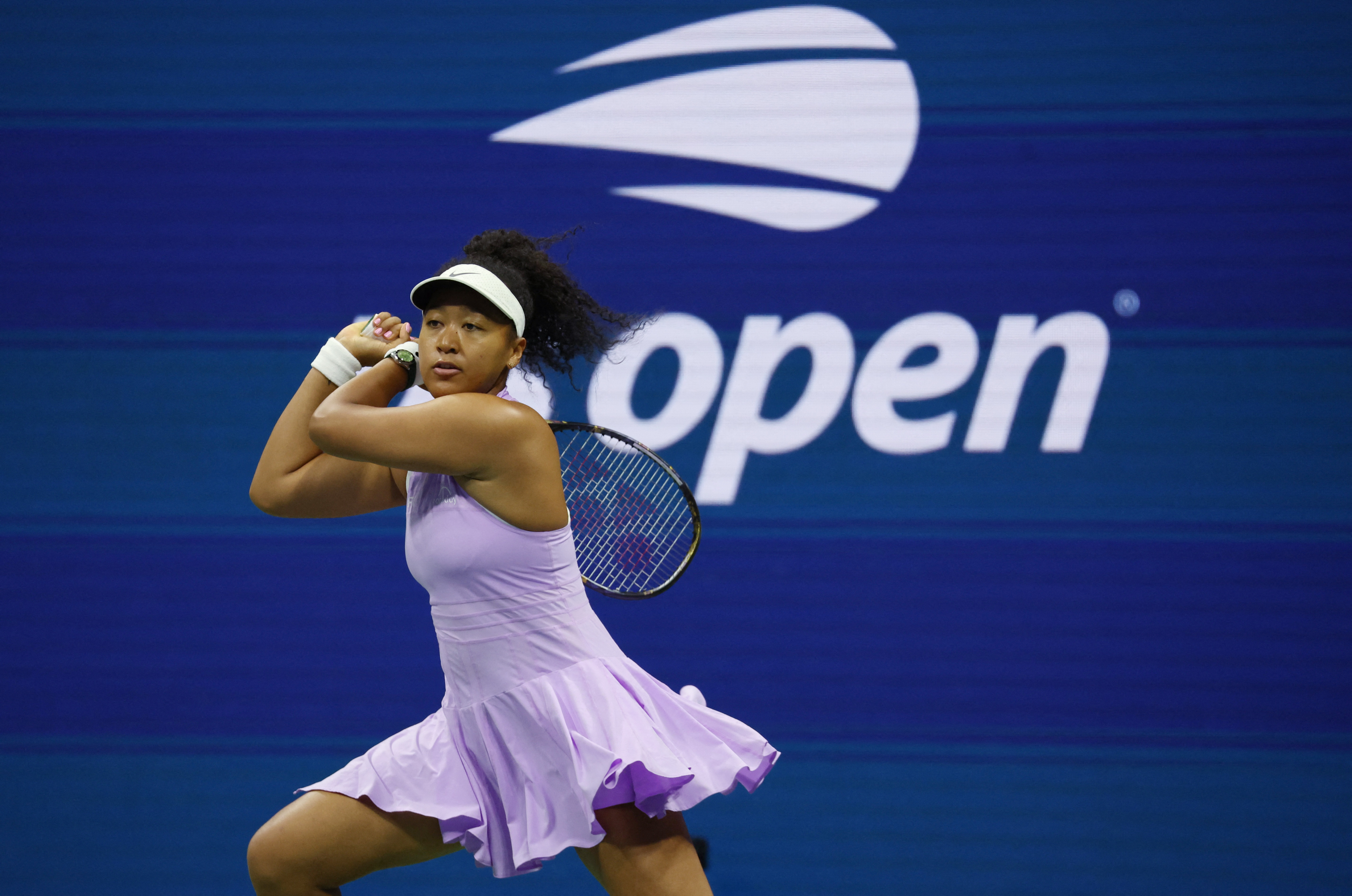 Tennis - U.S. Open - Flushing Meadows, New York, United States - August 30, 2022 Japan's Naomi Osaka in action during her first round match against Danielle Collins of the U.S. REUTERS/Shannon Stapleton