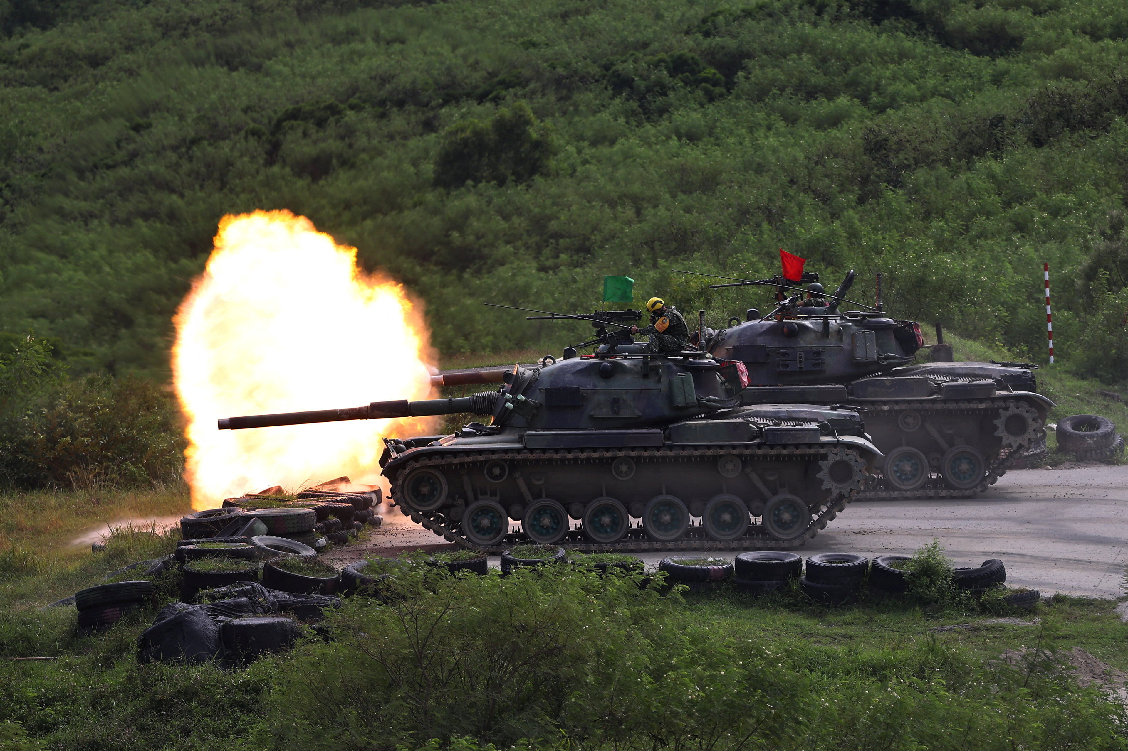 Taiwanese forces CM-11 Brave Tiger fires during a live-fire military exercise in Pingtung, Taiwan