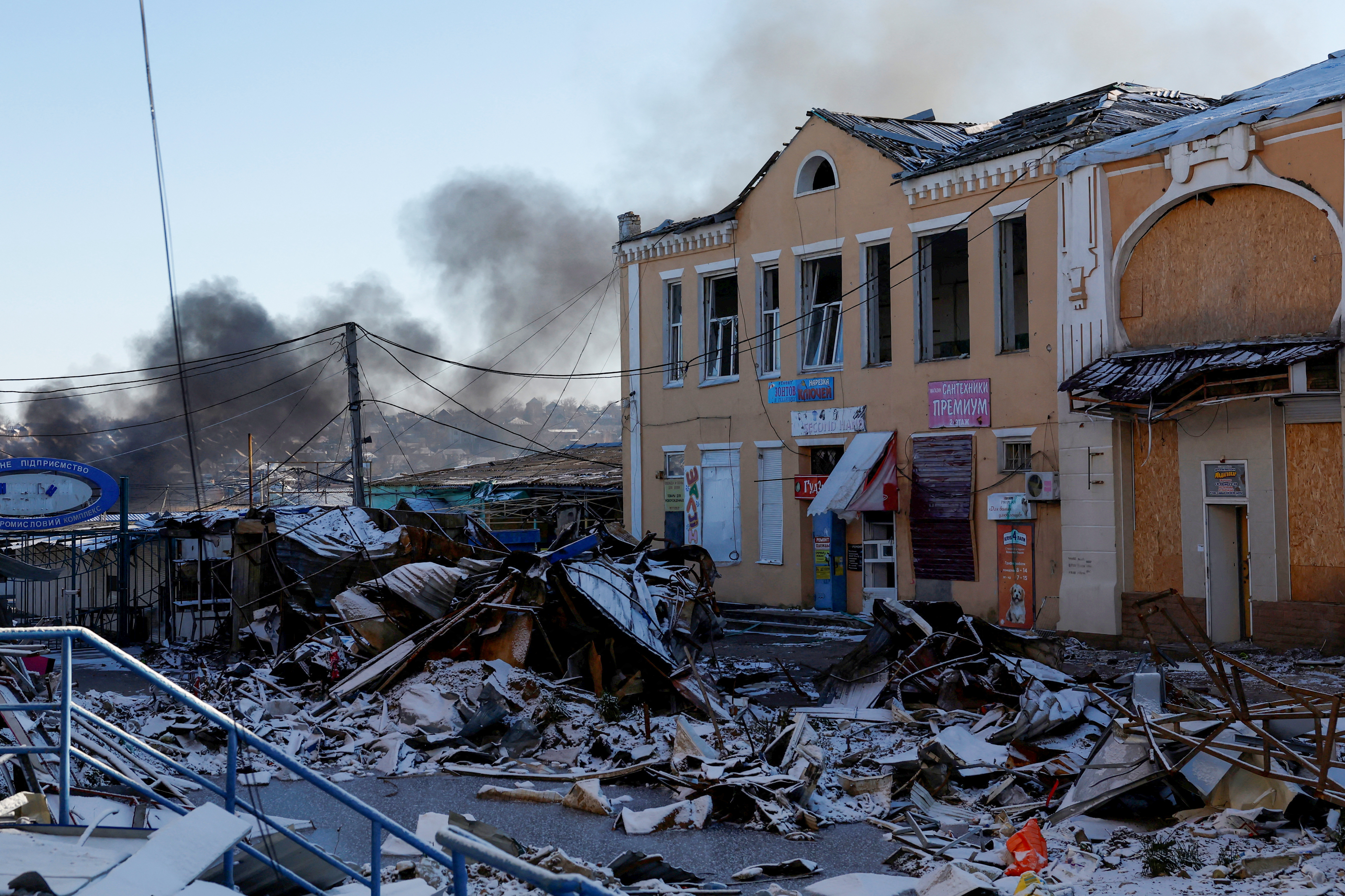 Plumes of smoke rise from a Russian strike