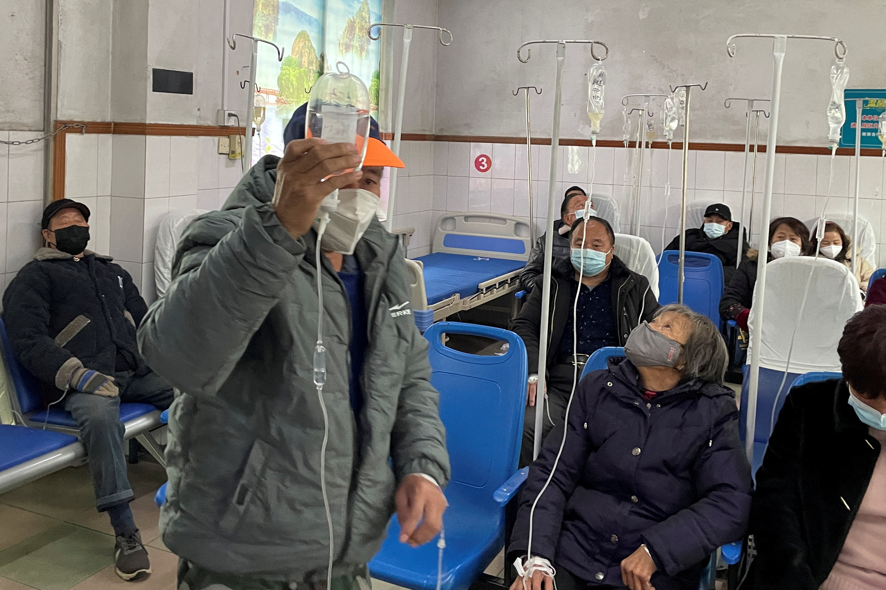 Patients receive IV drip treatment at a hospital, amid the coronavirus disease (COVID-19) outbreak, at a village in Tonglu county, Zhejiang province, China.