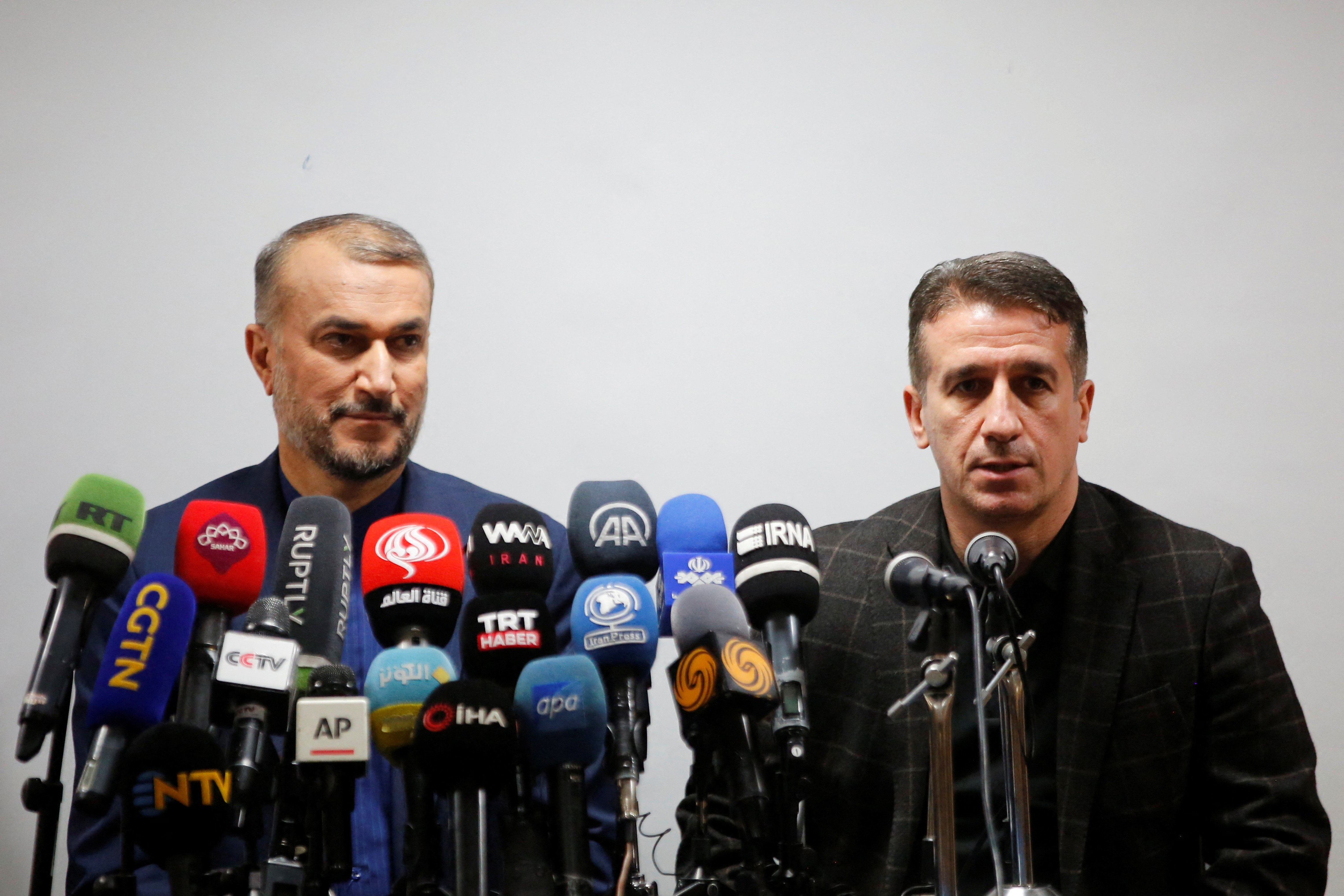 Iran's Foreign Minister Hossein Amir-Abdollahian and ambassador of Azerbaijan to Iran Ali Alizada attend a joint news conference in Tajrish hospital in Tehran