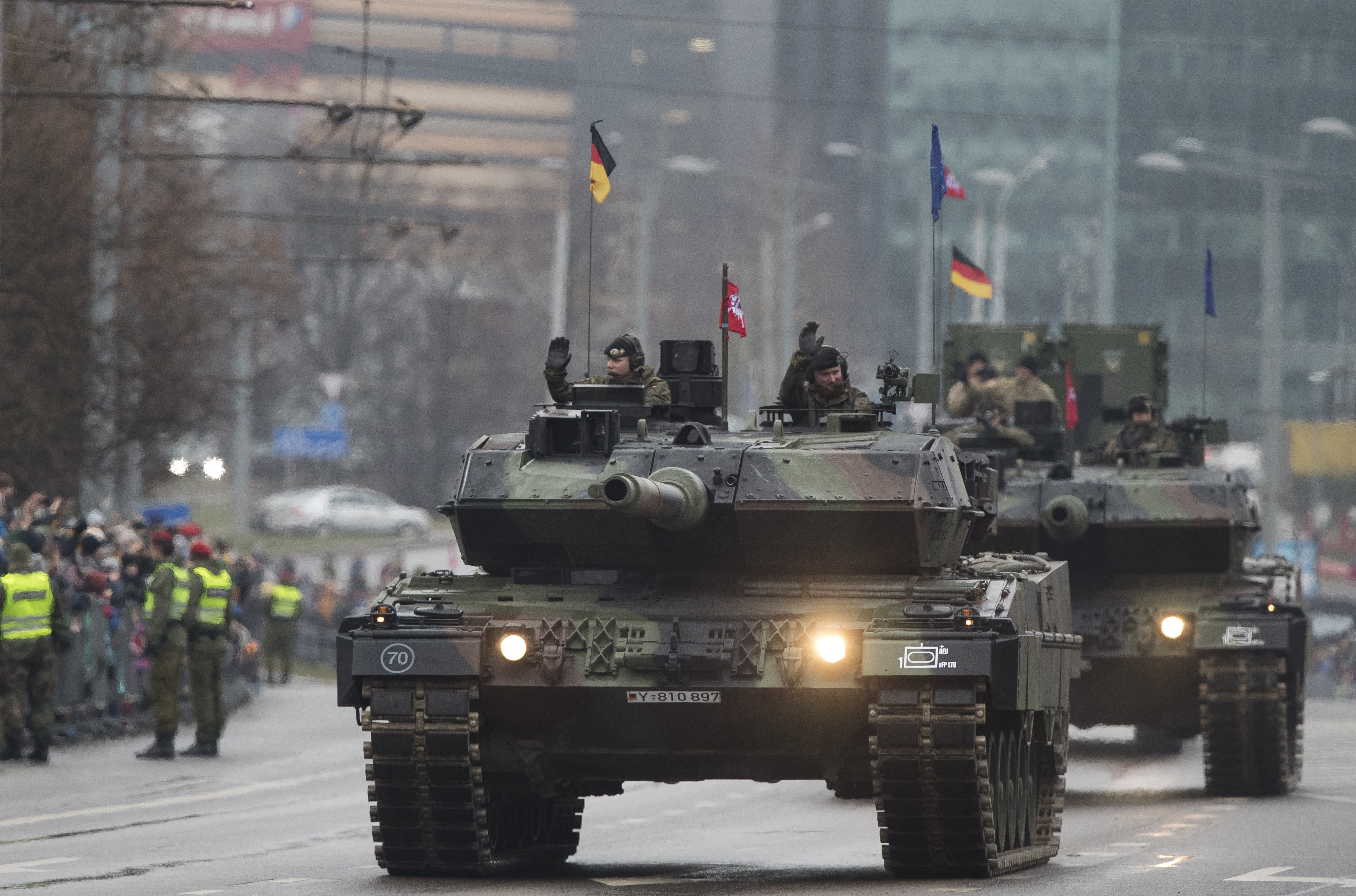 Members of the German Army with Leopard 2 tanks participate in military parade to celebrate the 100th anniversary of the Lithuanian military on Armed Forces Day in Vilnius, Lithuania.