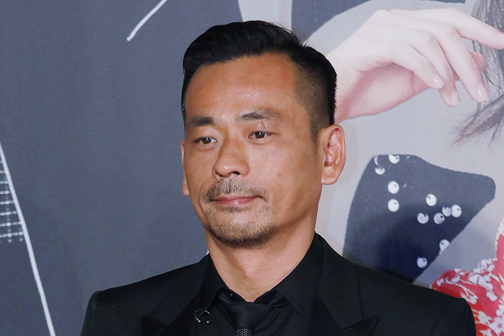 Former Suncity Group CEO Alvin Chau poses on the red carpet of the Hong Kong Film Awards in Hong Kong, April 15, 2018.