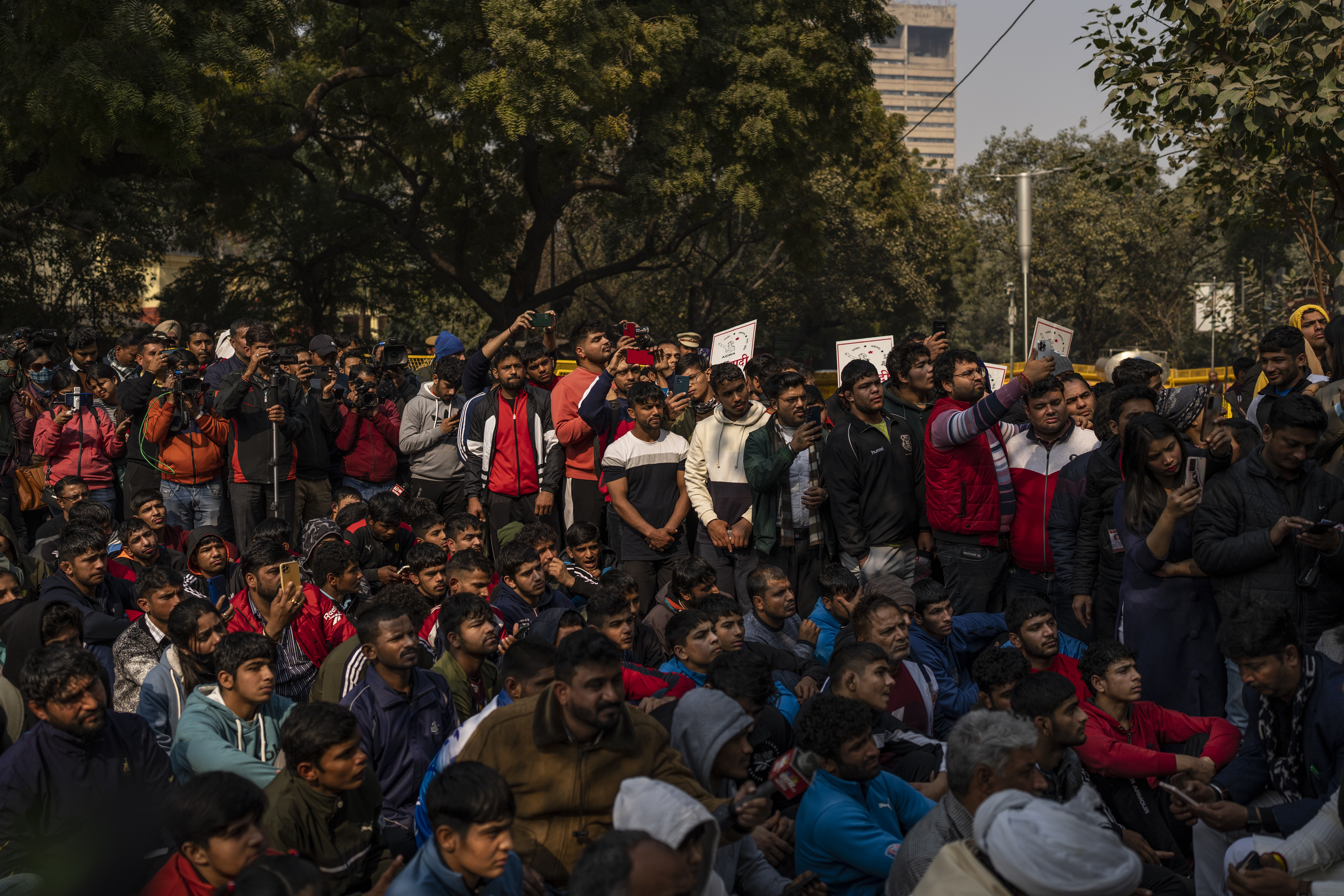 Indian wrestlers and their supporters participate in a protest against Wrestling Foundation of India President Brij Bhushan Charan Singh and other officials in New Delhi, India, Thursday, Jan. 19, 2023. Top India wrestlers led a sit-in protest near the parliament building on Thursday accusing the federation president and coaches of sexually and mentally harassing young wrestlers. (AP Photo/Altaf Qadri)