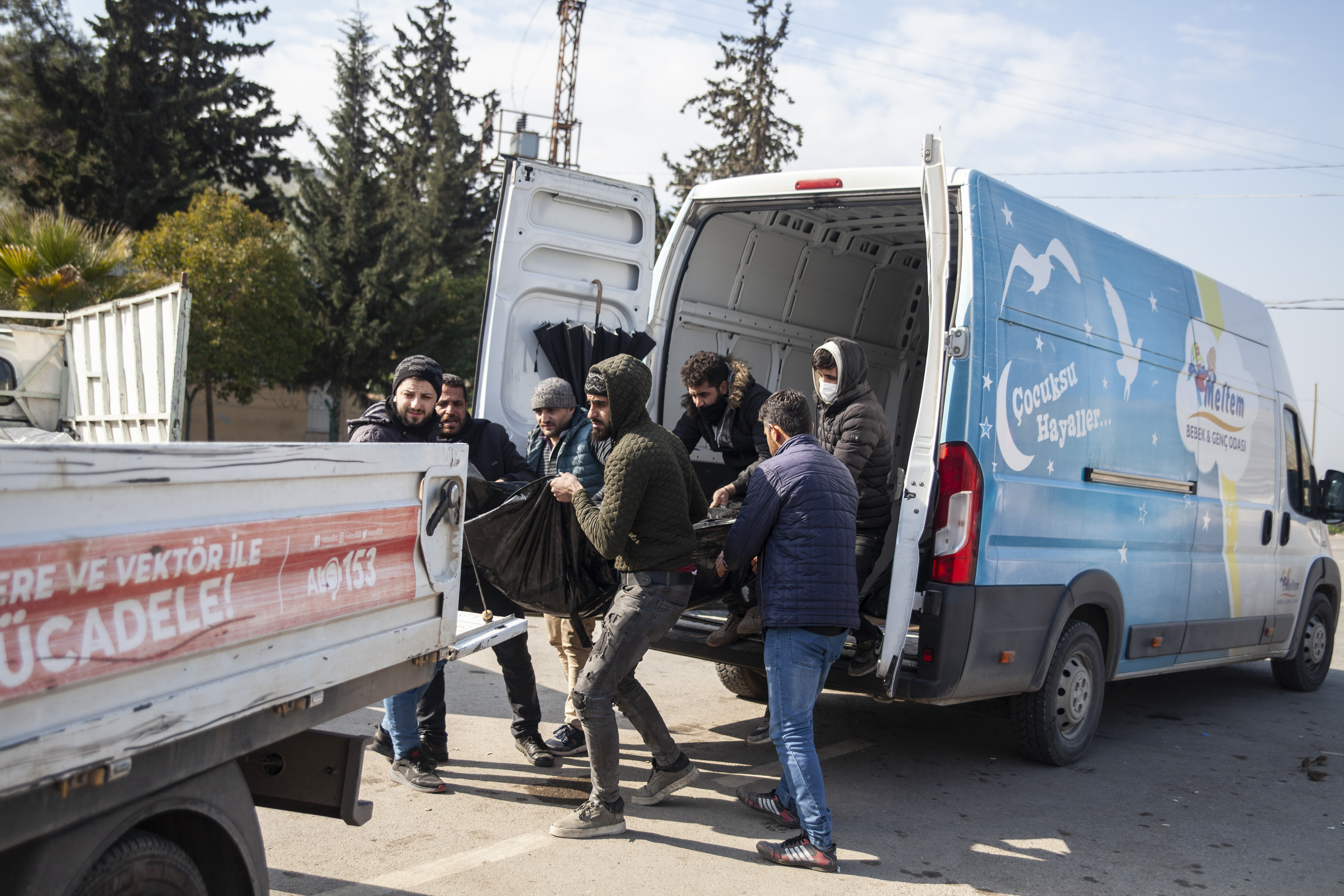 Colourful baby gear van pulls up to unload dead bodies