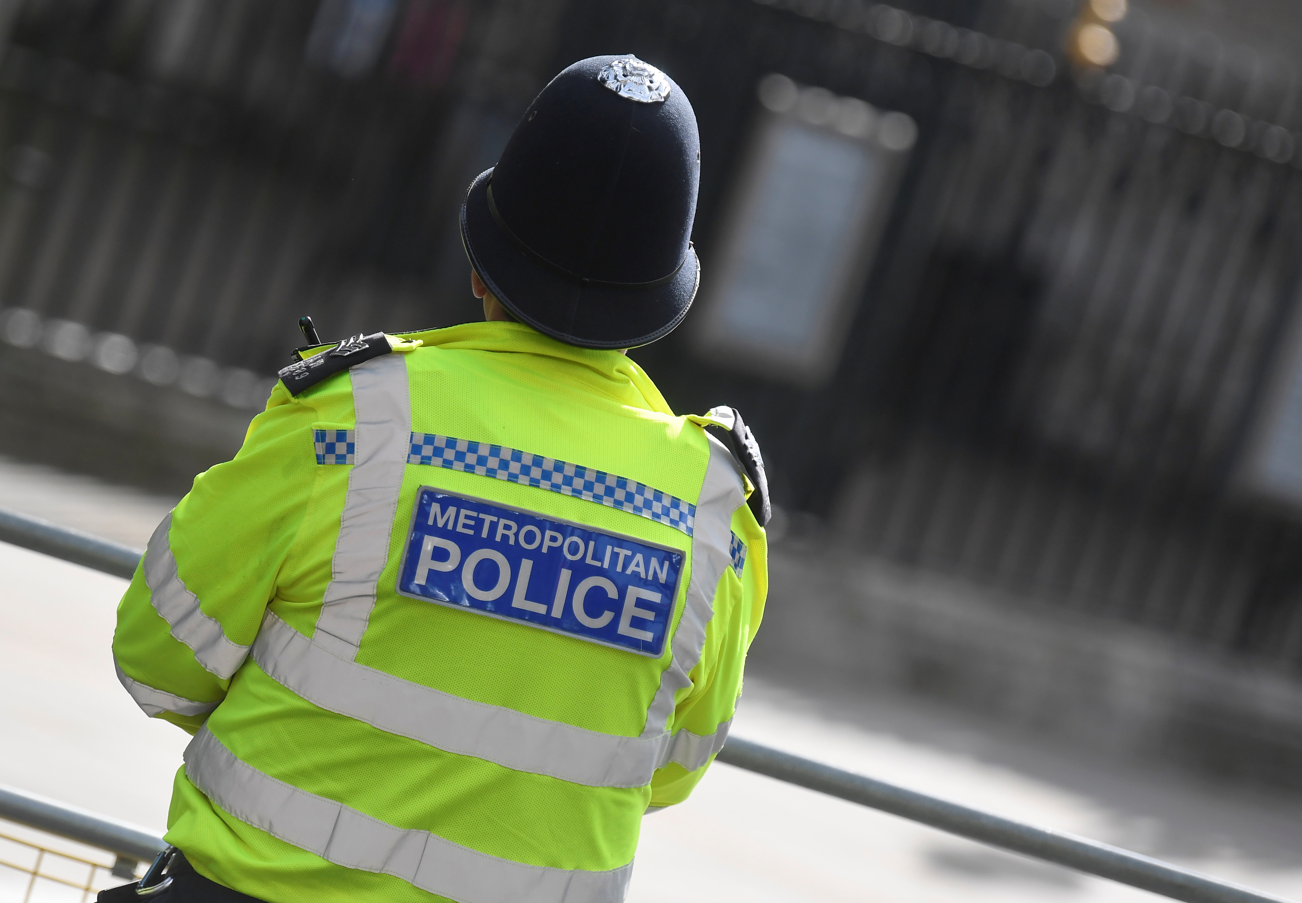 A Metropolitan Police officer stands on duty in Westminster