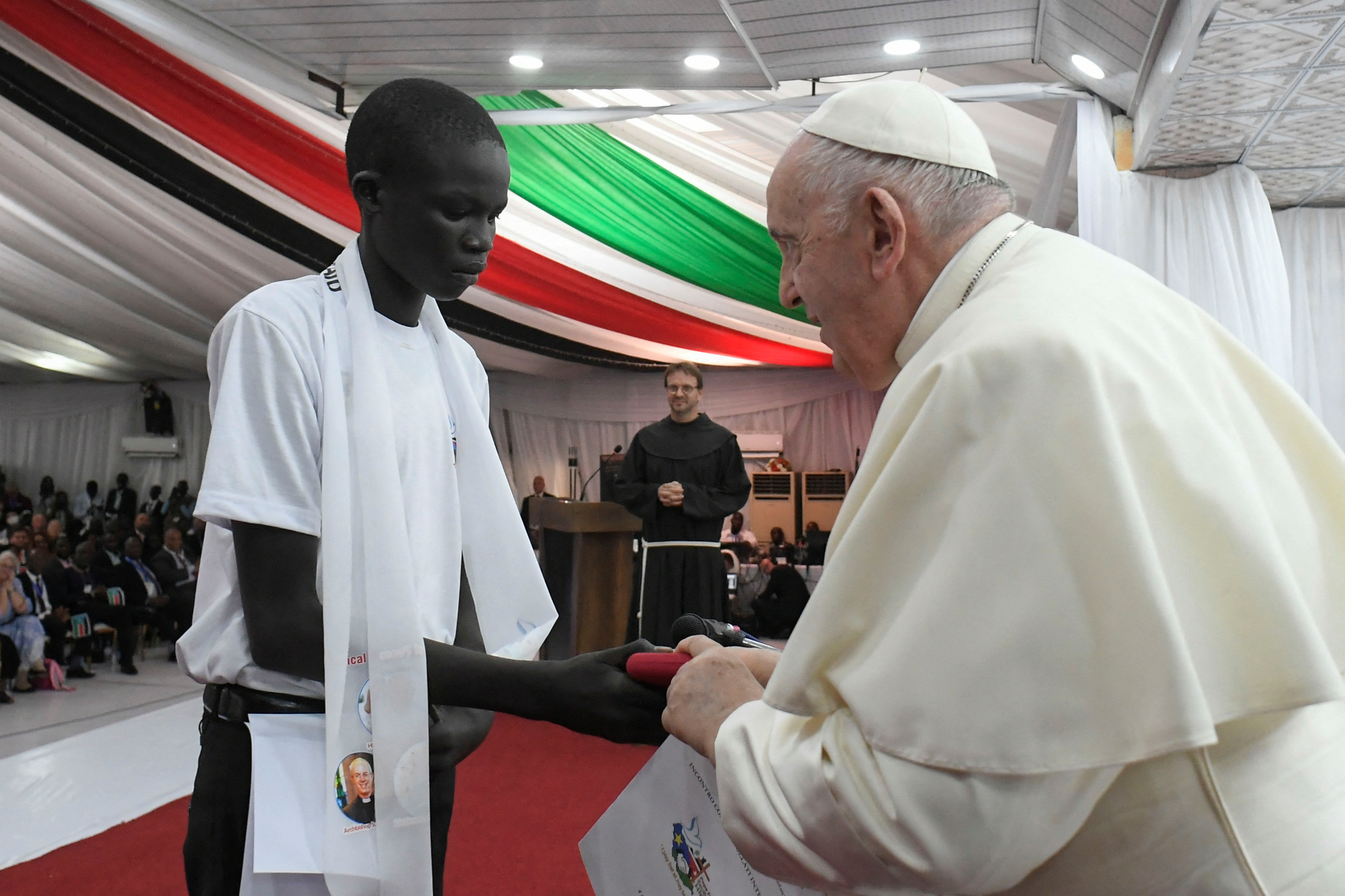 Pope Francis meets displaced child