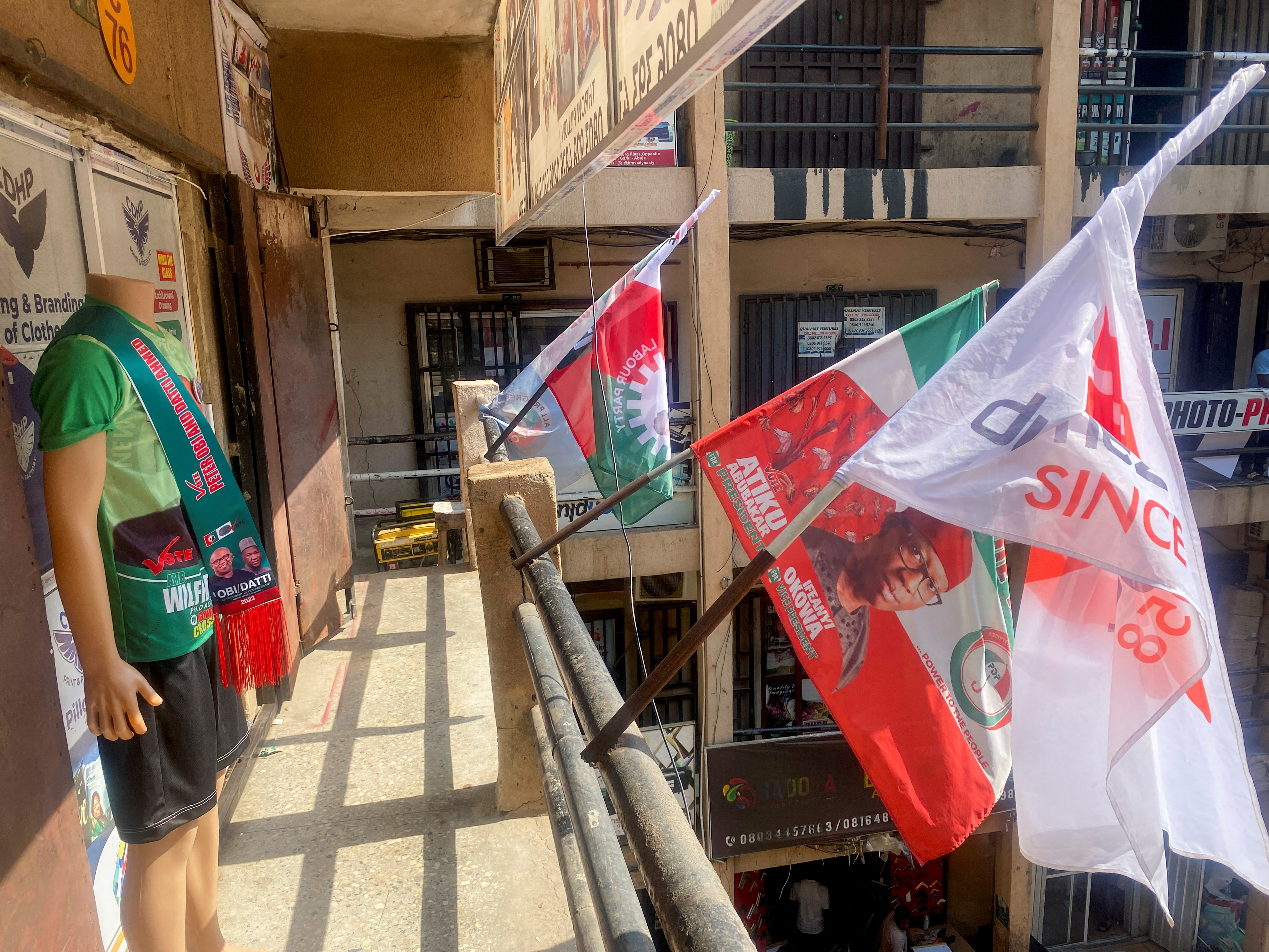 Branded flags with images of Nigerian presidential candidates