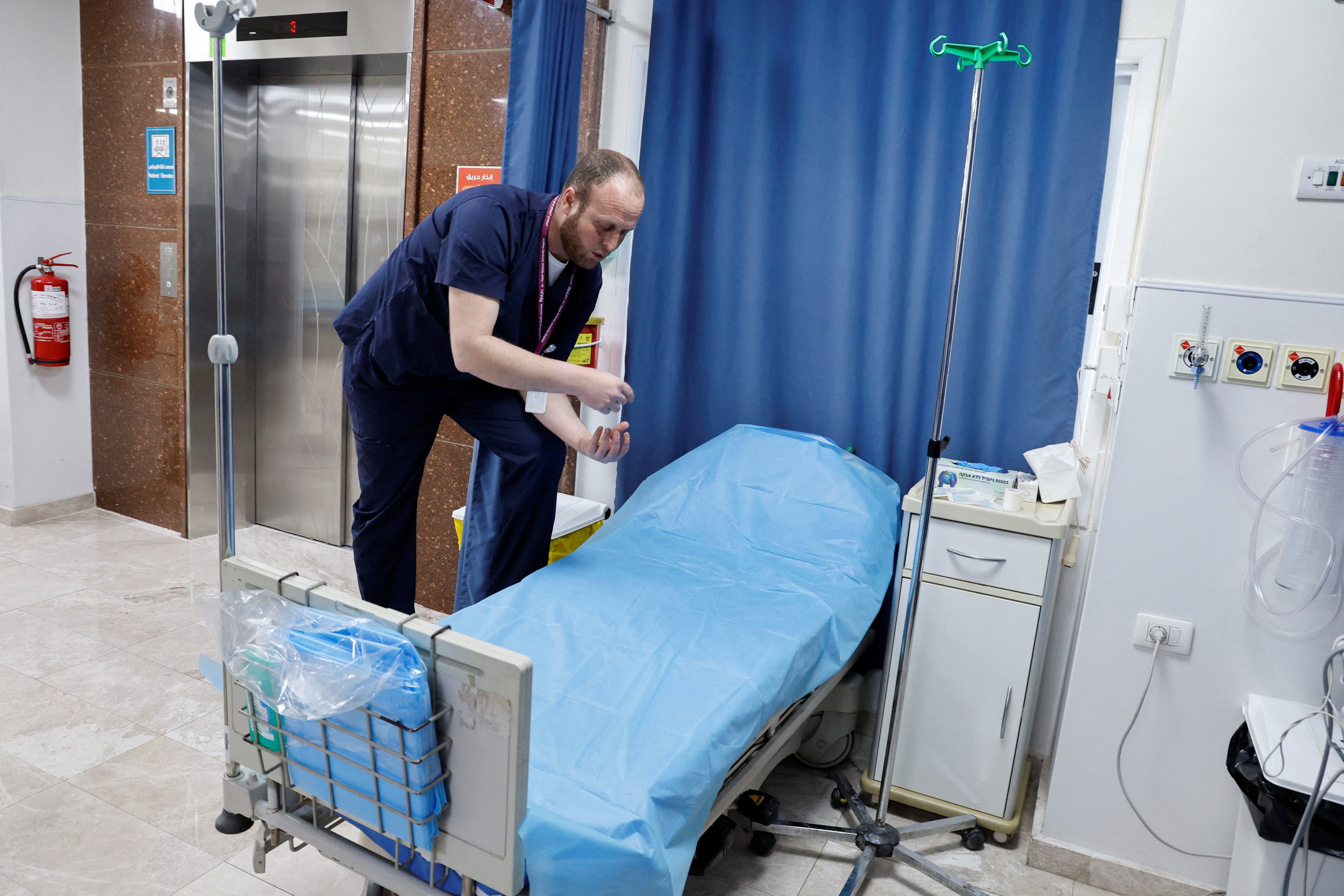 Palestinian nurse Ahmad al-Aswad explains how fellow nurse Elias al-Ashkar rushed to provide assistance