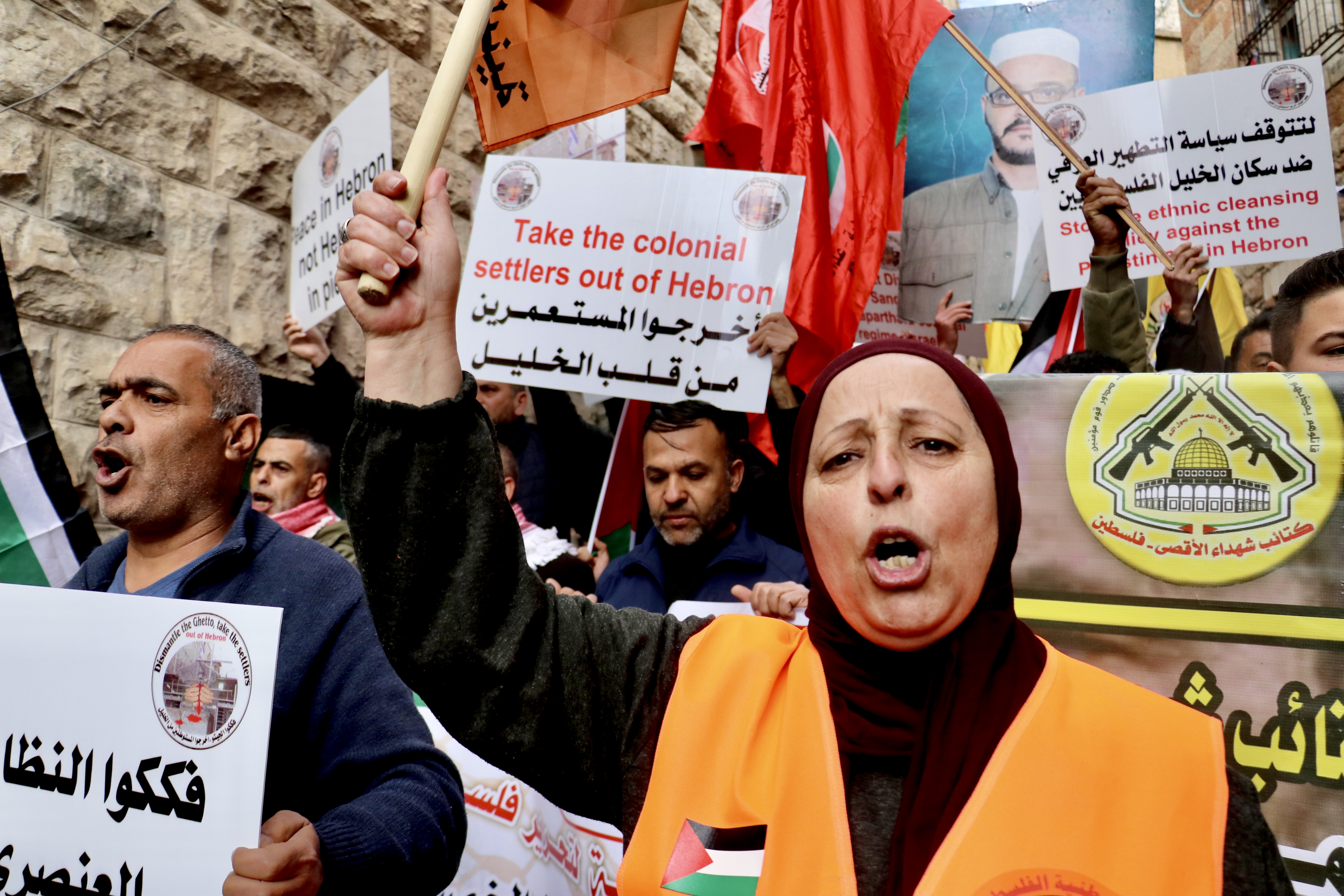 Palestinians protesting the on the anniversary of the Ibrahimi mosque massacre by an American-Israeli settler
