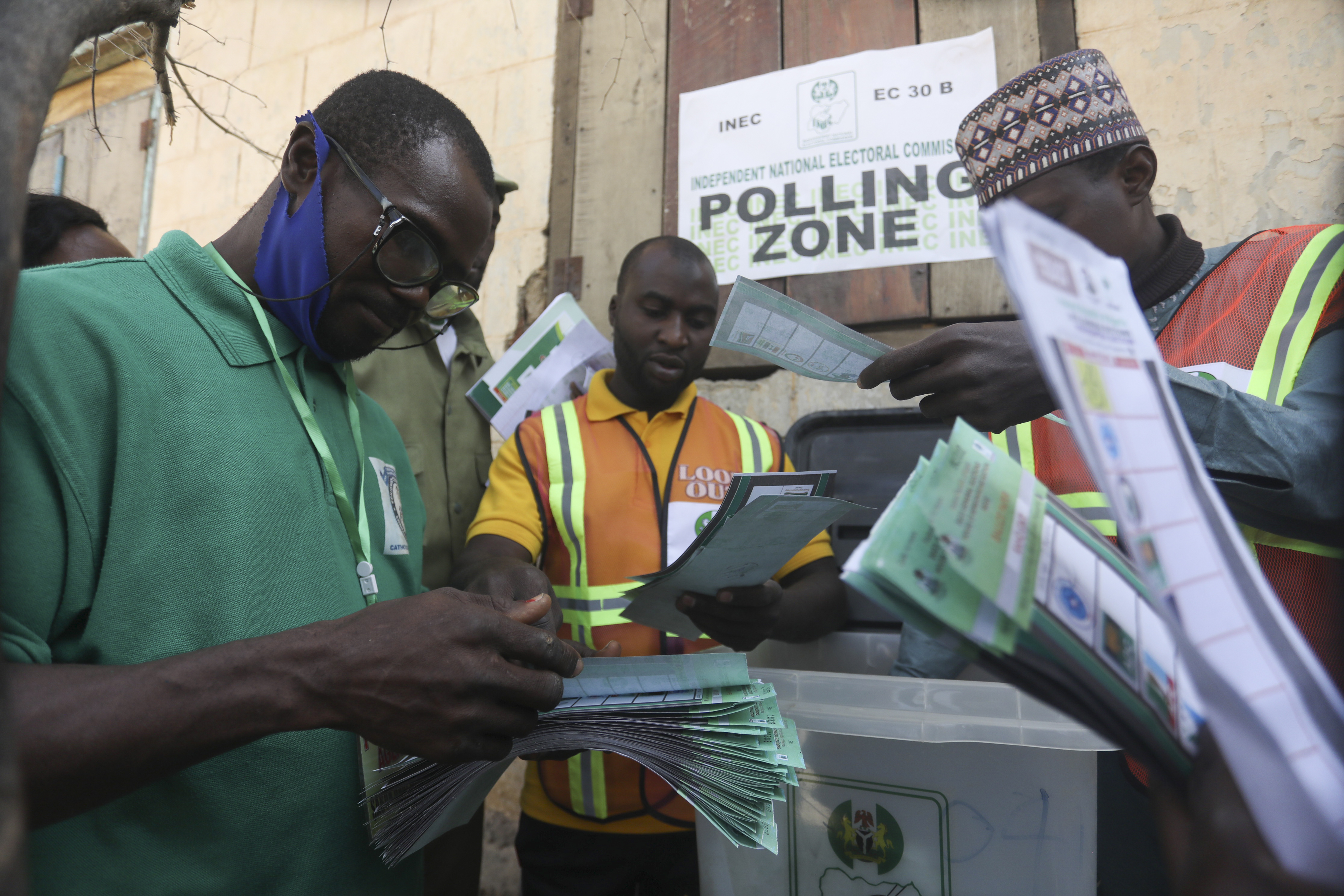 Officials sort ballots in Nigeria's vote