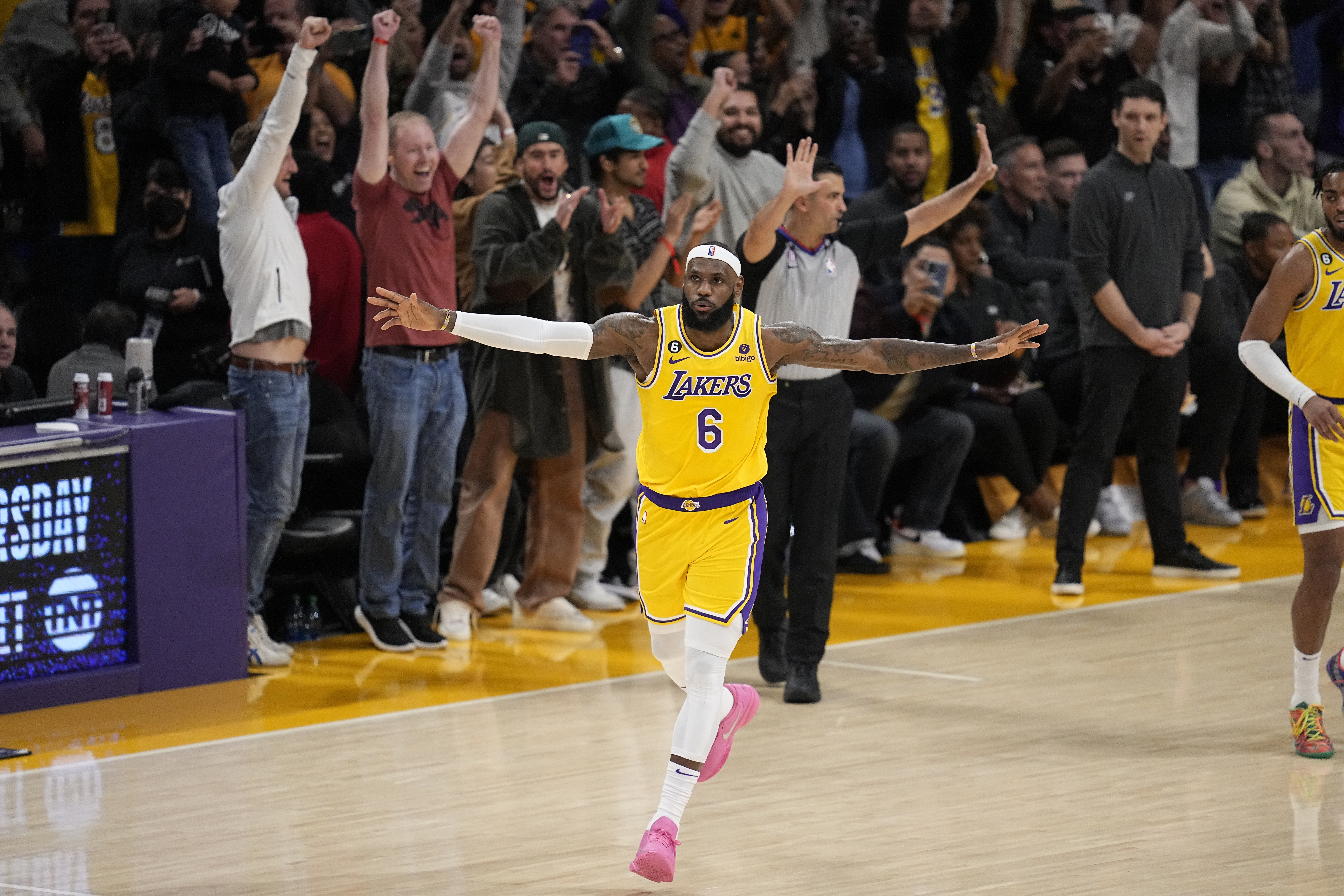 Los Angeles Lakers forward LeBron James celebrates after scoring to pass Kareem Abdul-Jabbar to become the NBA's all-time leading scorer