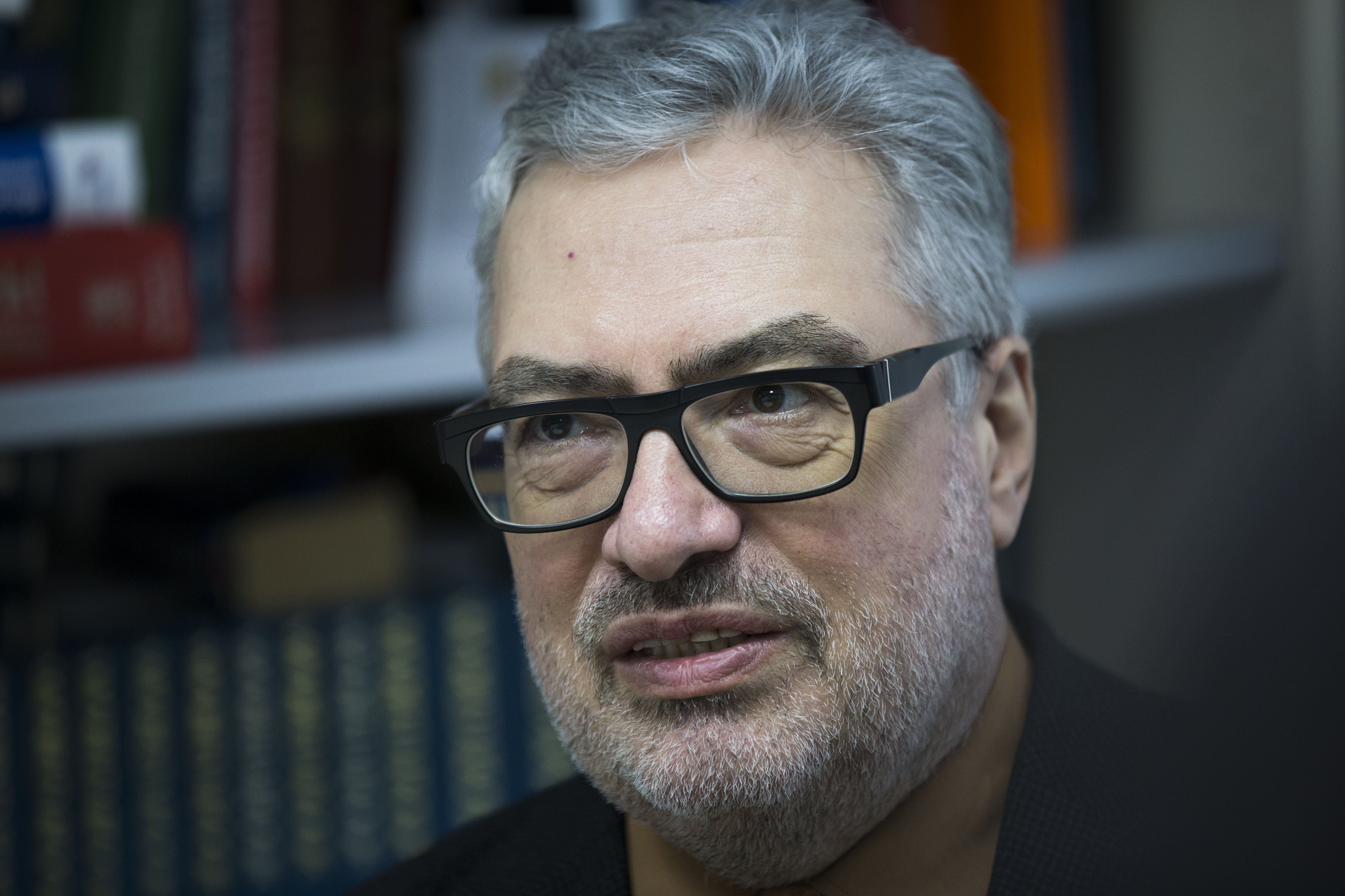 Independent military analyst Pavel Felgenhauer speaks to The Associated Press in Moscow, Russia, Monday, April 6, 2015. Felgenhaeur says Russia is not interested in an all-out war in eastern Ukraine but wants to keep up the tensions by training the rebel forces and making sure theyre combat-ready. (AP Photo/Alexander Zemlianichenko)