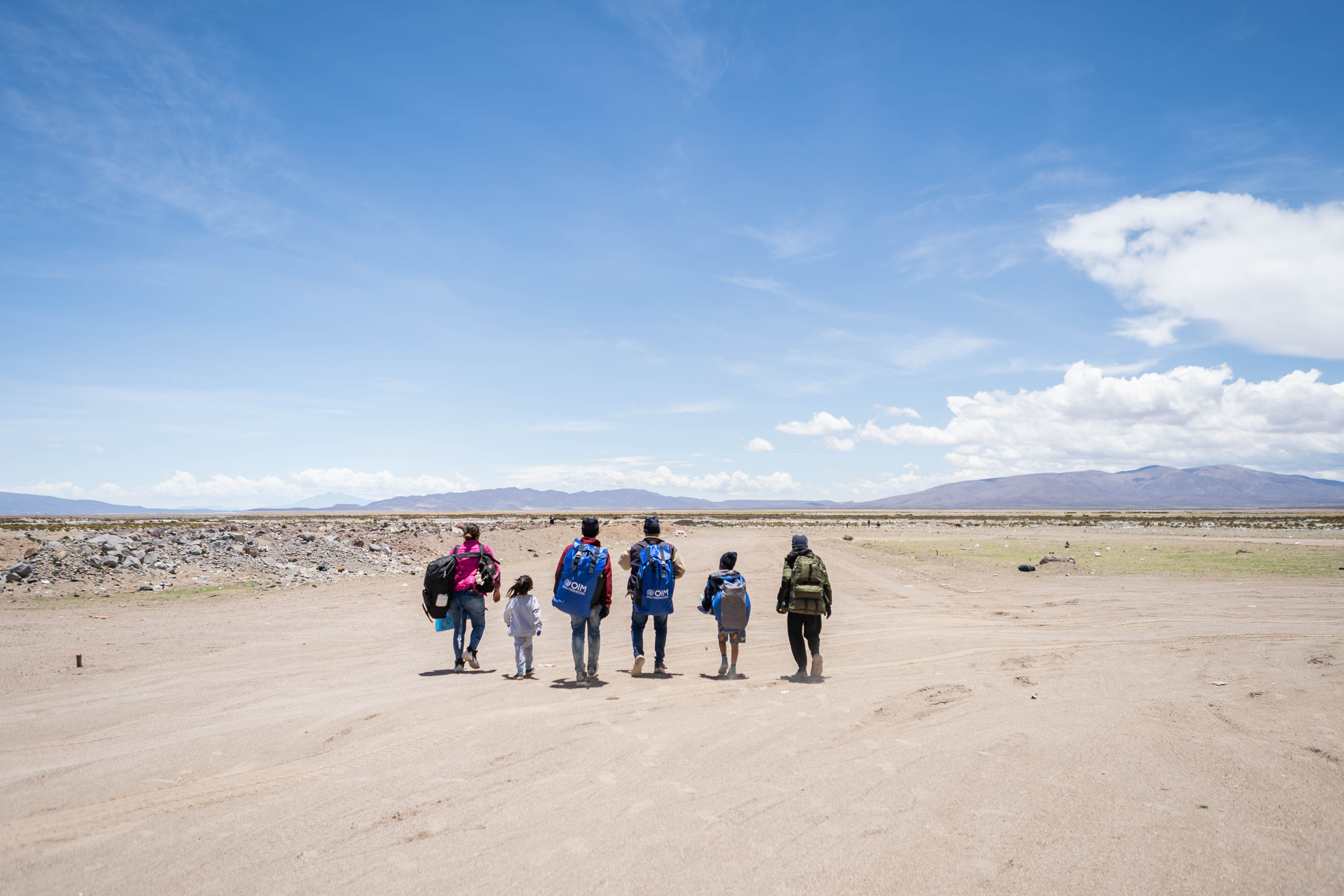 Allyson and her family trudge across the empty highlands