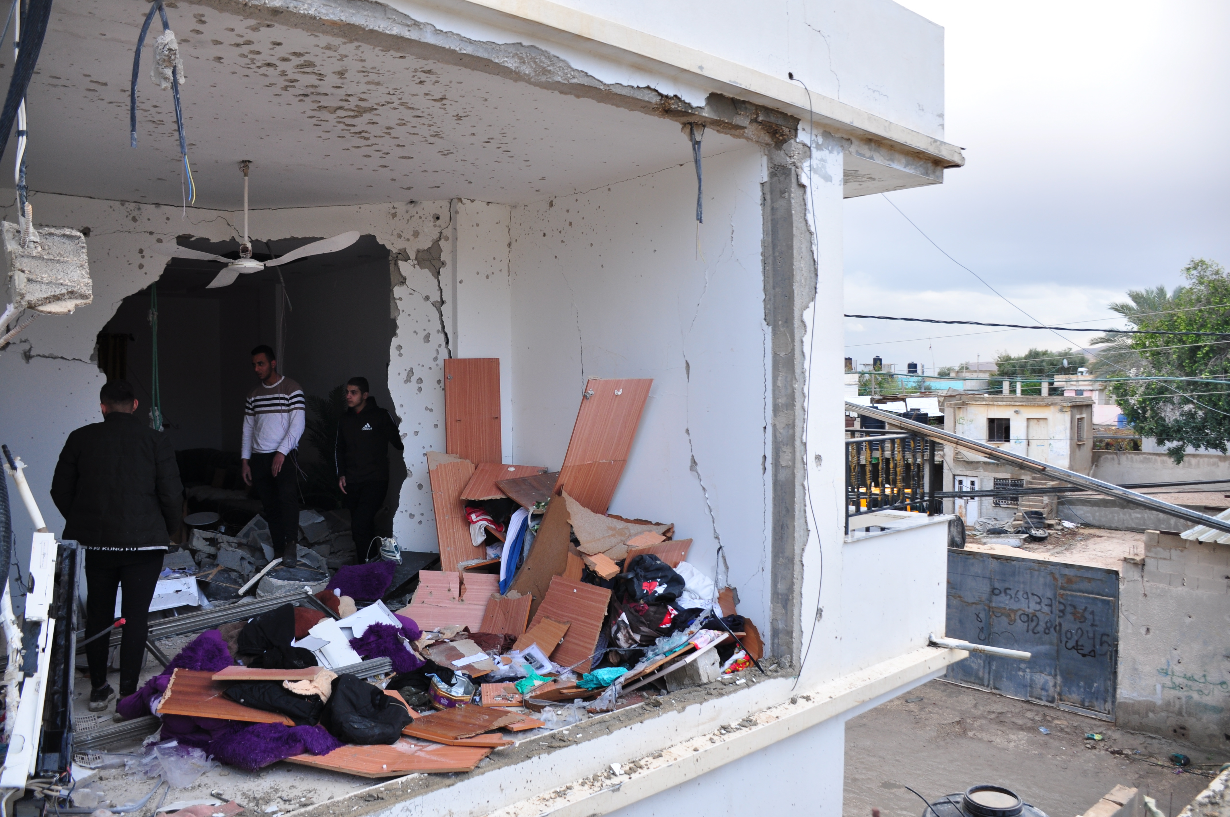 The home of Adel Hassan Owaidat which was hit with anti-tank missiles while he and seven of his family members were at home