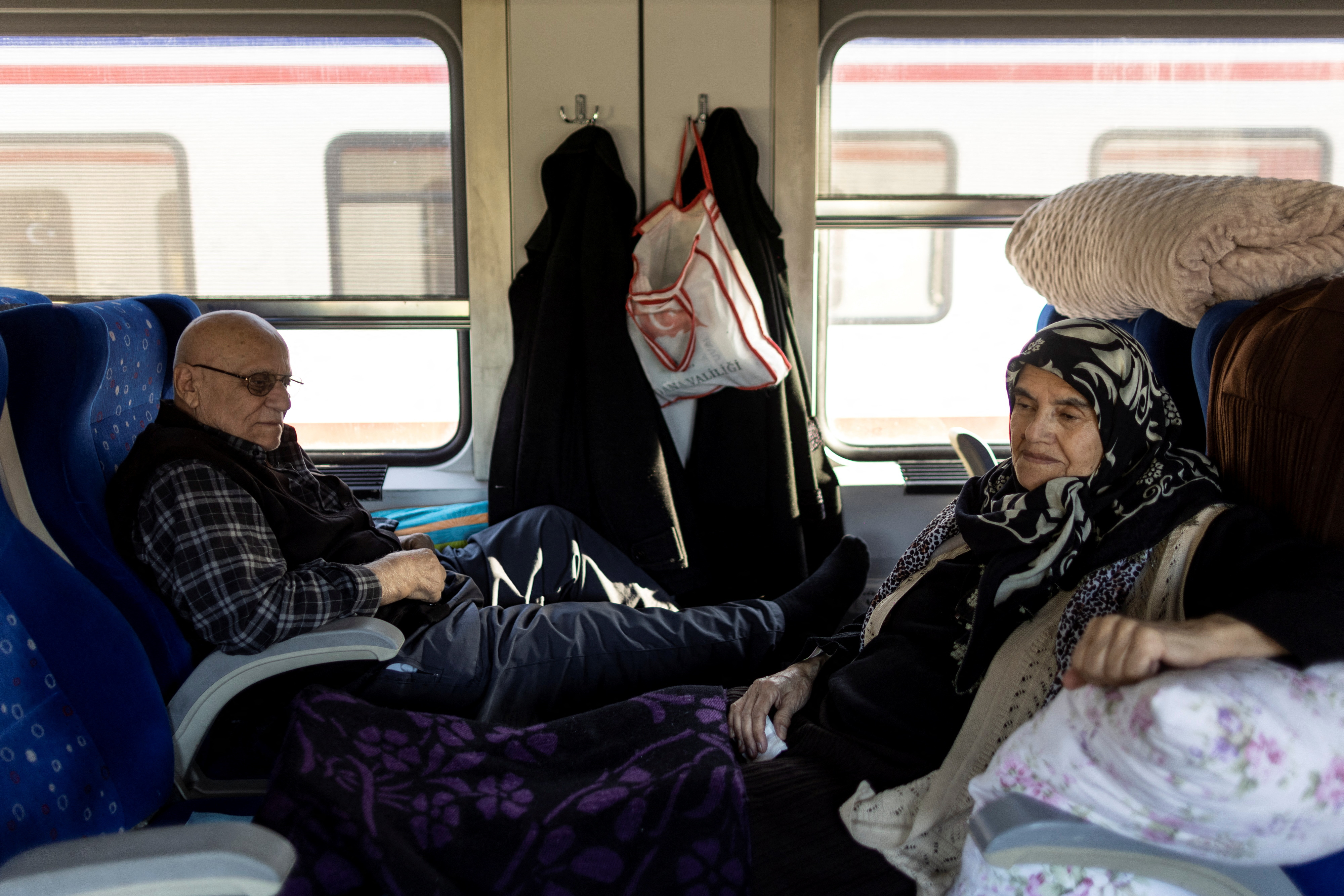 Turkish families shelter on a train after earthquake brought life to a standstill