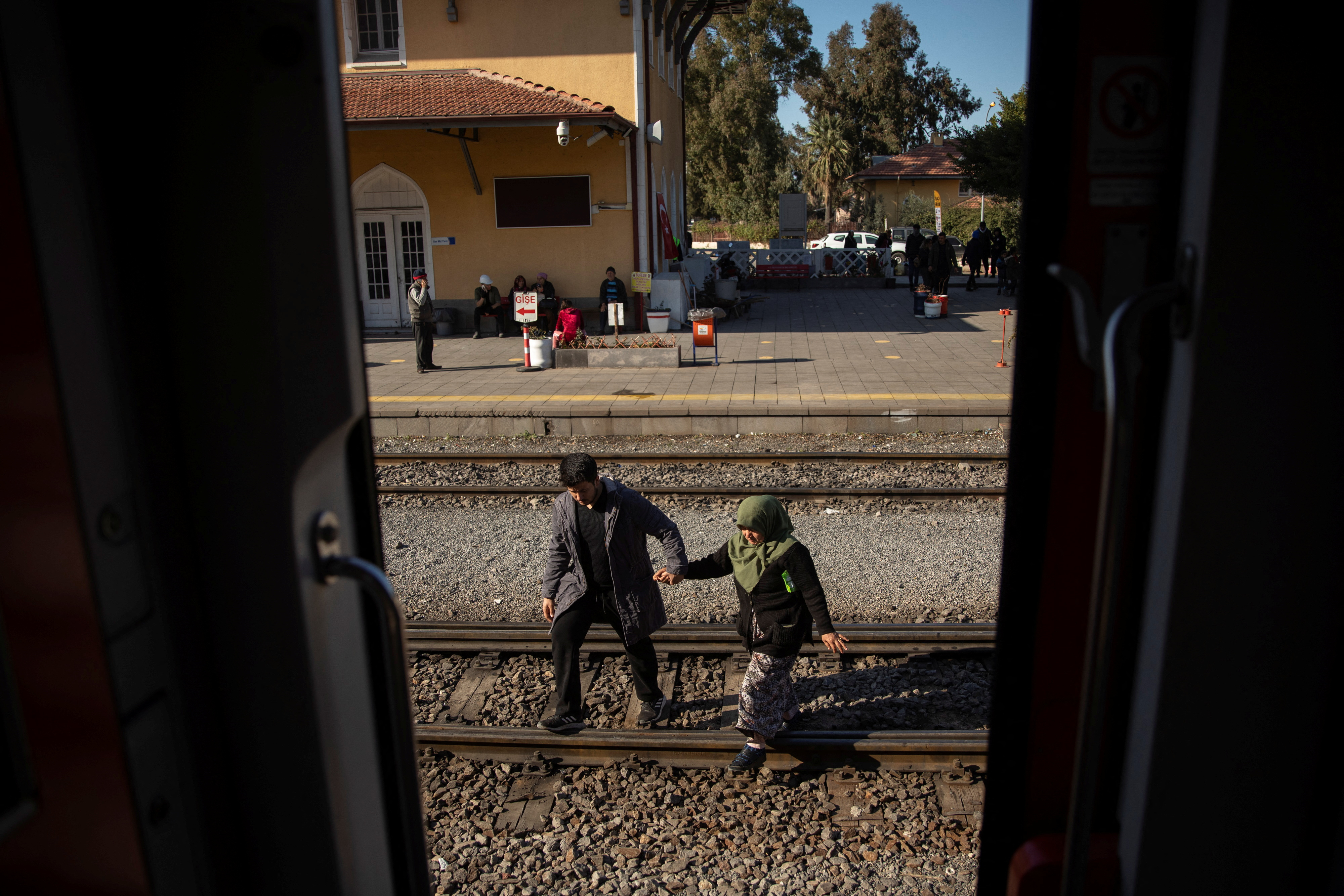 Turkish families shelter on a train after earthquake brought life to a standstill