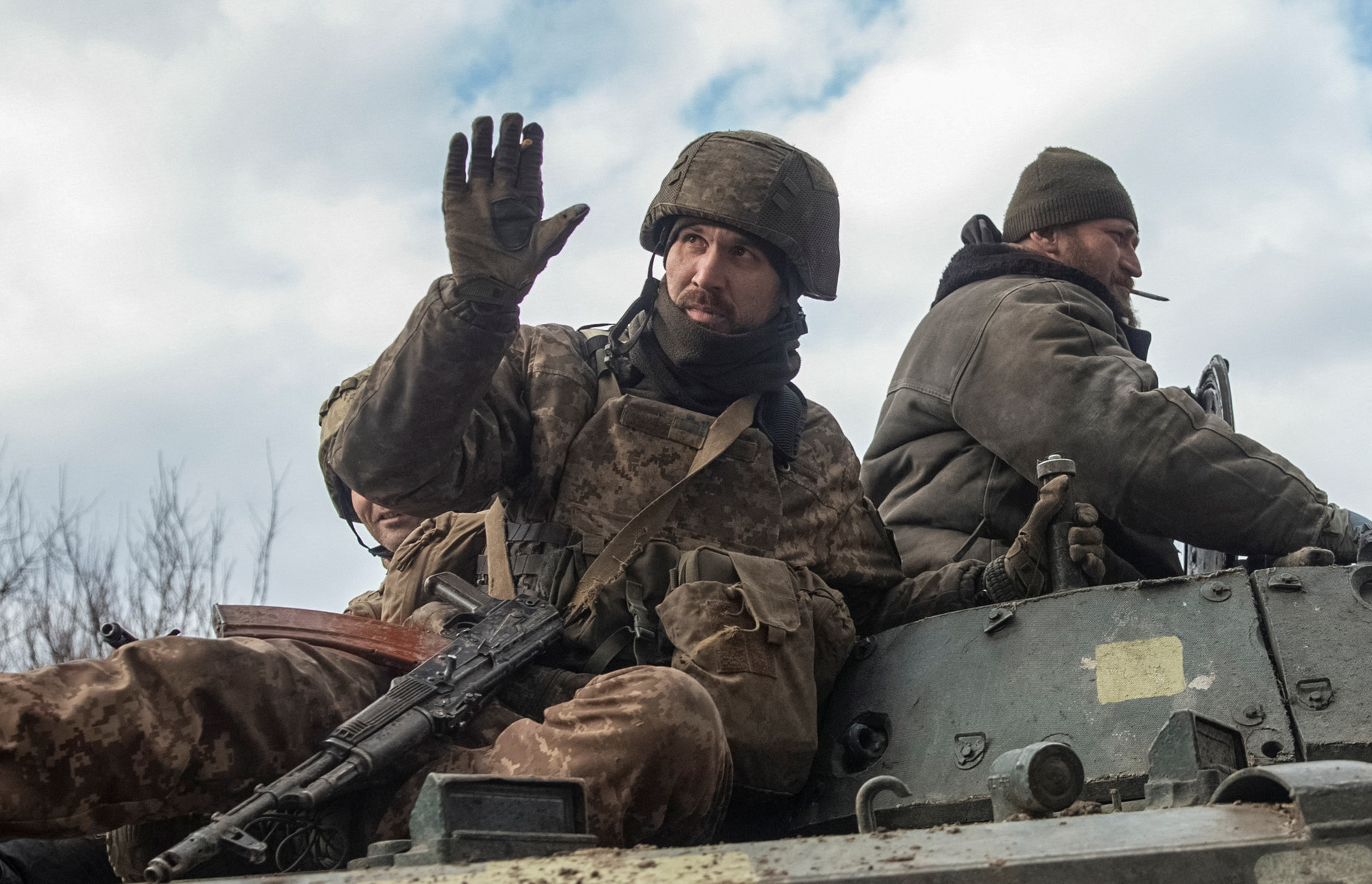 Ukrainian service members ride a BMP-1 infantry fighting vehicle, as Russia's attack on Ukraine continues, in the front line city of Bakhmut, Ukraine March 3, 2023. REUTERS/Oleksandr Ratushniak