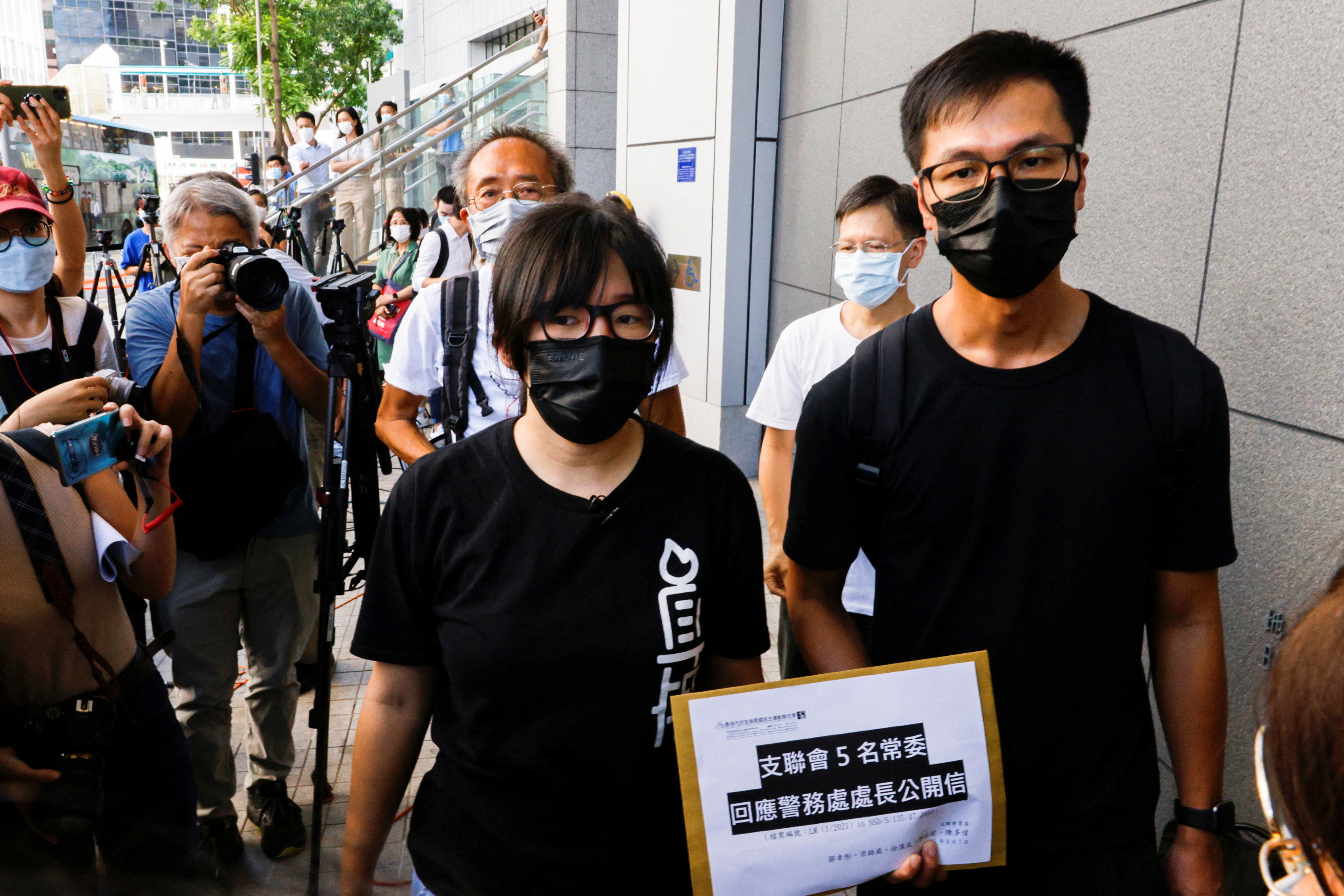 FILE PHOTO: Hong Kong Alliance in Support of Patriotic Democratic Movements of China Vice-Chairwoman, Tonyee Chow Hang-tung arrives at police headquarters in response to National Security Department's request on allegations of foreign agents in Hong Kong, China September 7, 2021. REUTERS/Tyrone Siu/File Photo