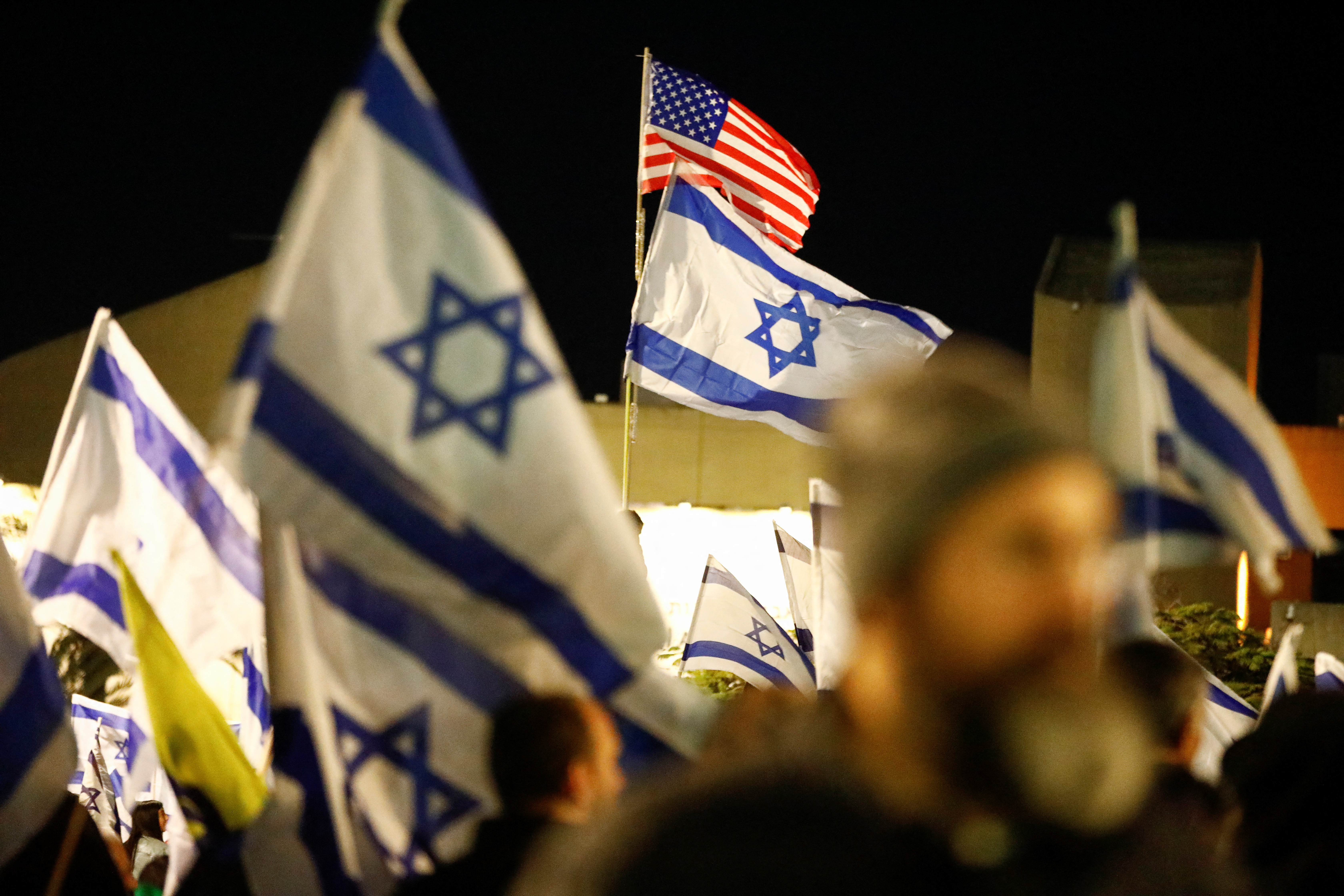 Israeli protestors attend a right-wing demonstration in support of Israel's nationalist coalition government and its judicial overhaul, in Tel Aviv, Israel March 30, 2023