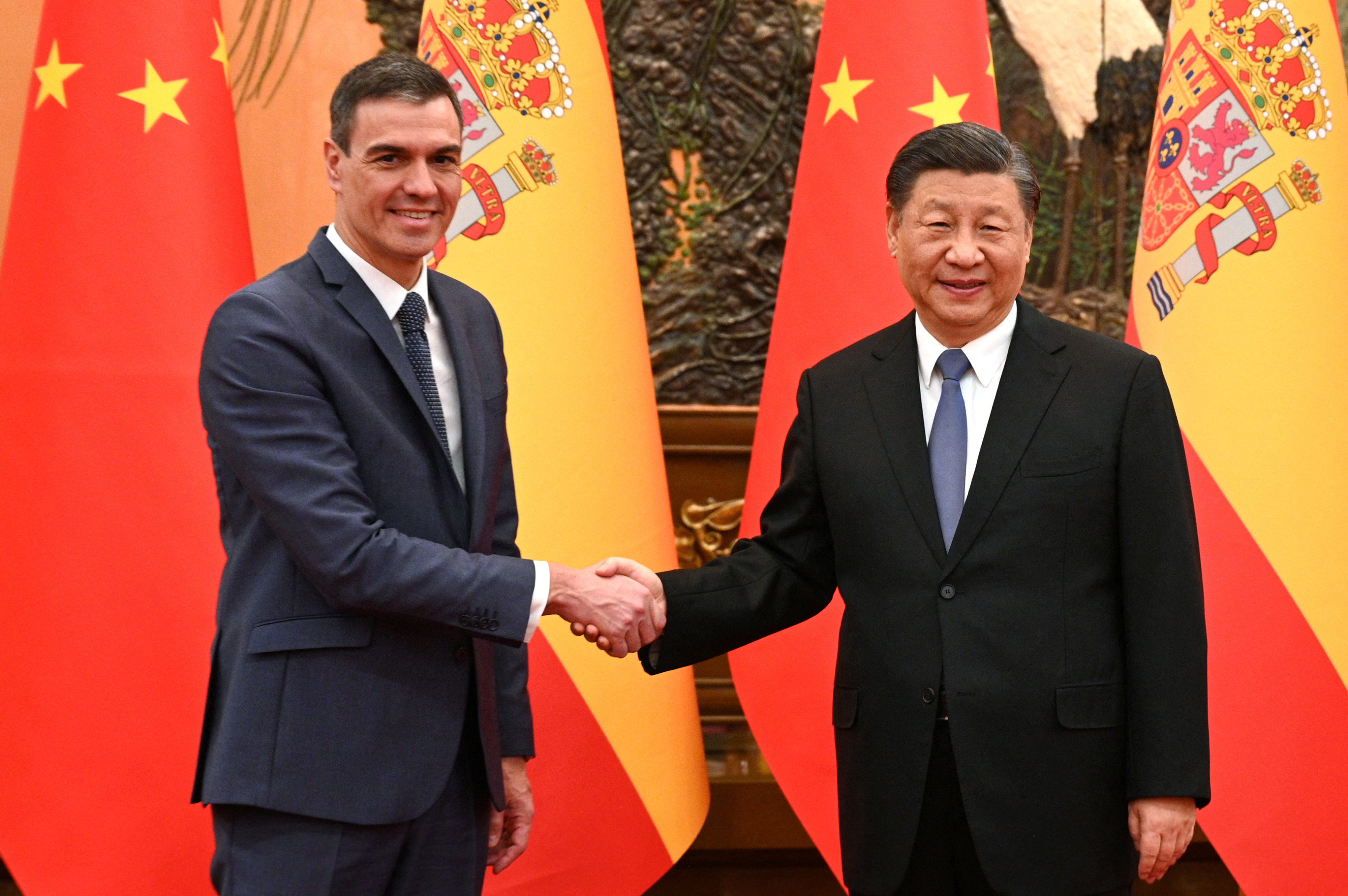 Pedro Sanchez and Xi Jinping