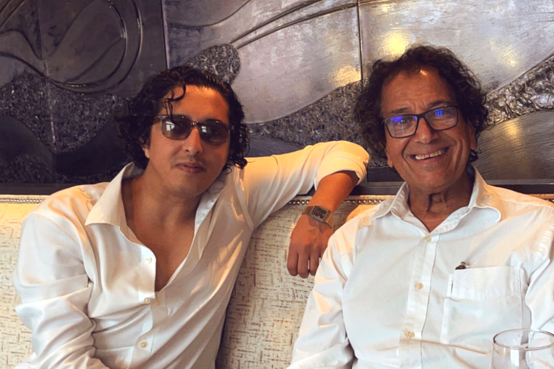 Ibrahim Almadi, who was released in Saudi Arabia, with his son