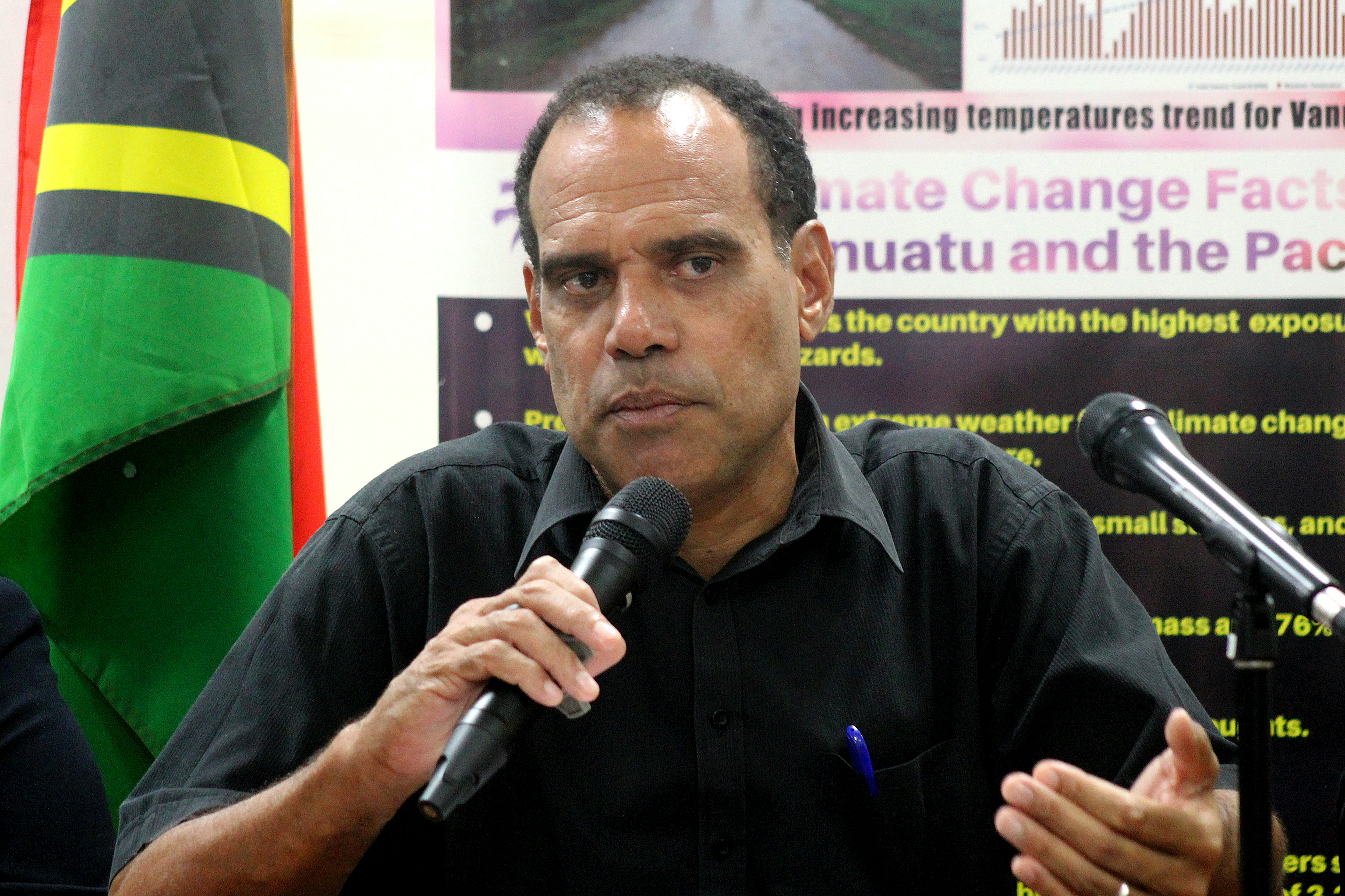 This picture taken on November 22, 2022 shows Vanuatu Climate Change Minister Ralph Regenvanu speaks to media in Port Vila. - Vanuatu is drawing up plans to relocate "dozens" of villages with in the next two years, as they come under threat from rising seas, the Pacific nation's climate chief told AFP on December 1. (Photo by Hilaire Bule / AFP)