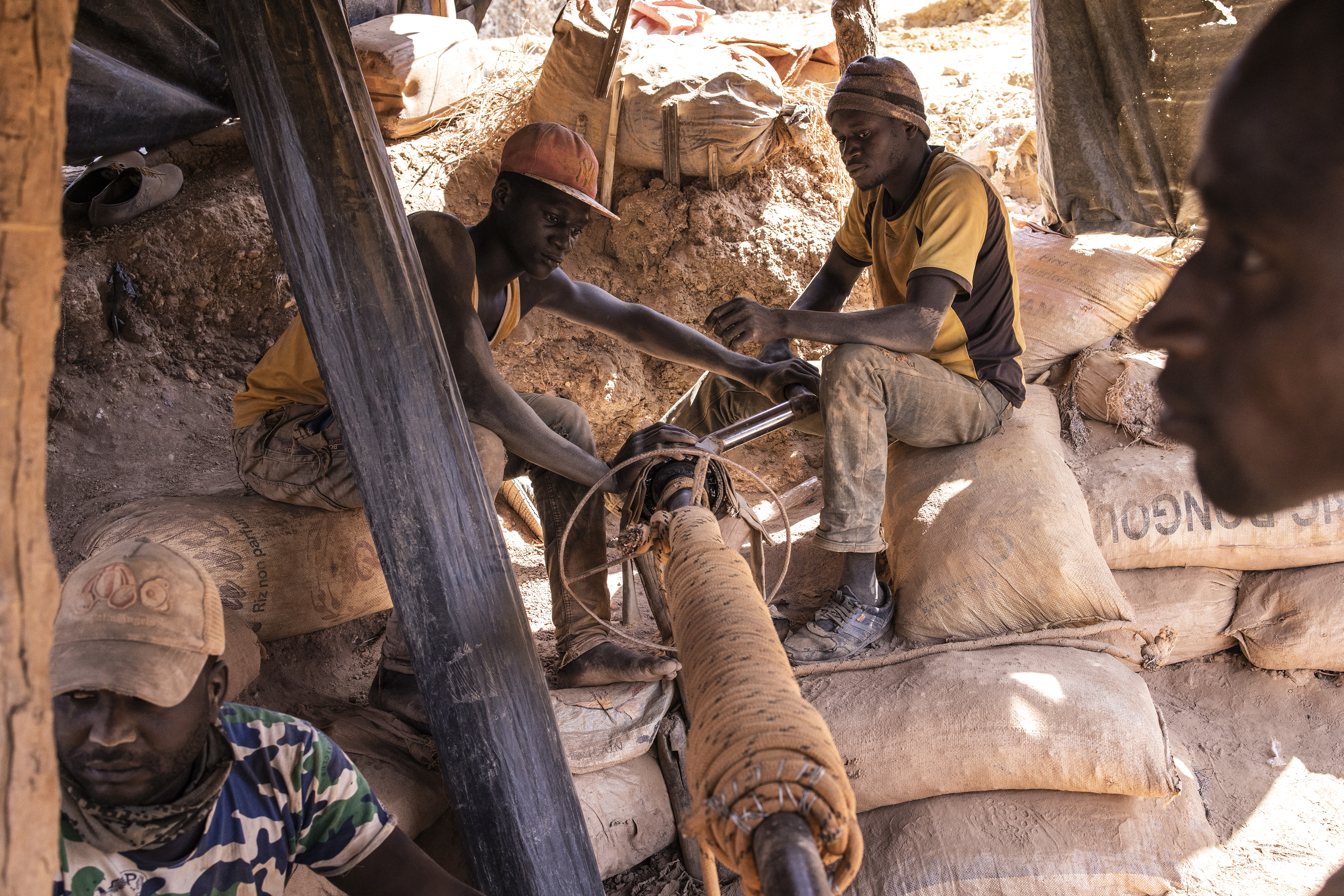 Artisanal gold miners search for gold at the Bantakokouta gold mine