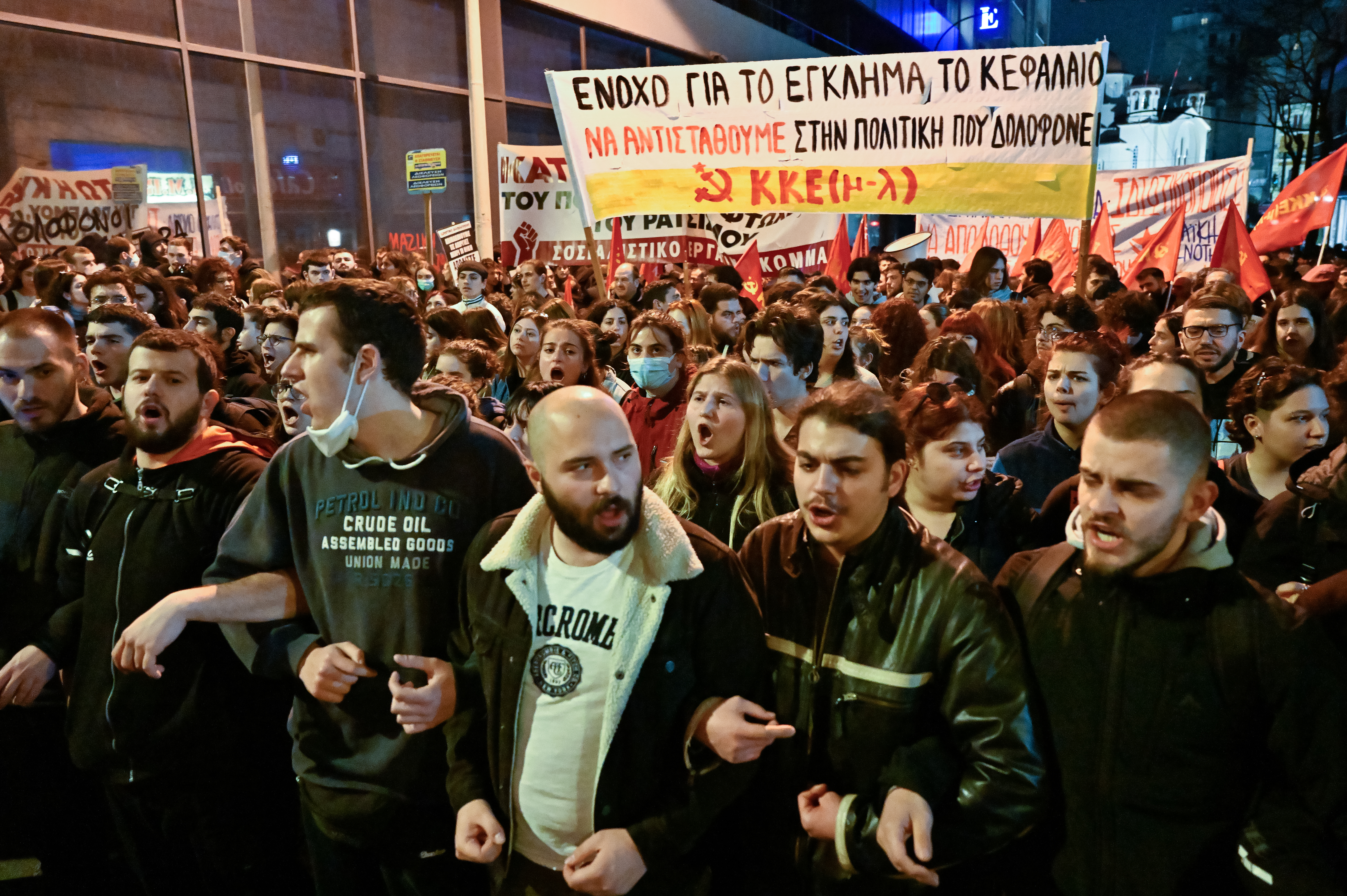 Students take part in a protest following a deadly train accident
