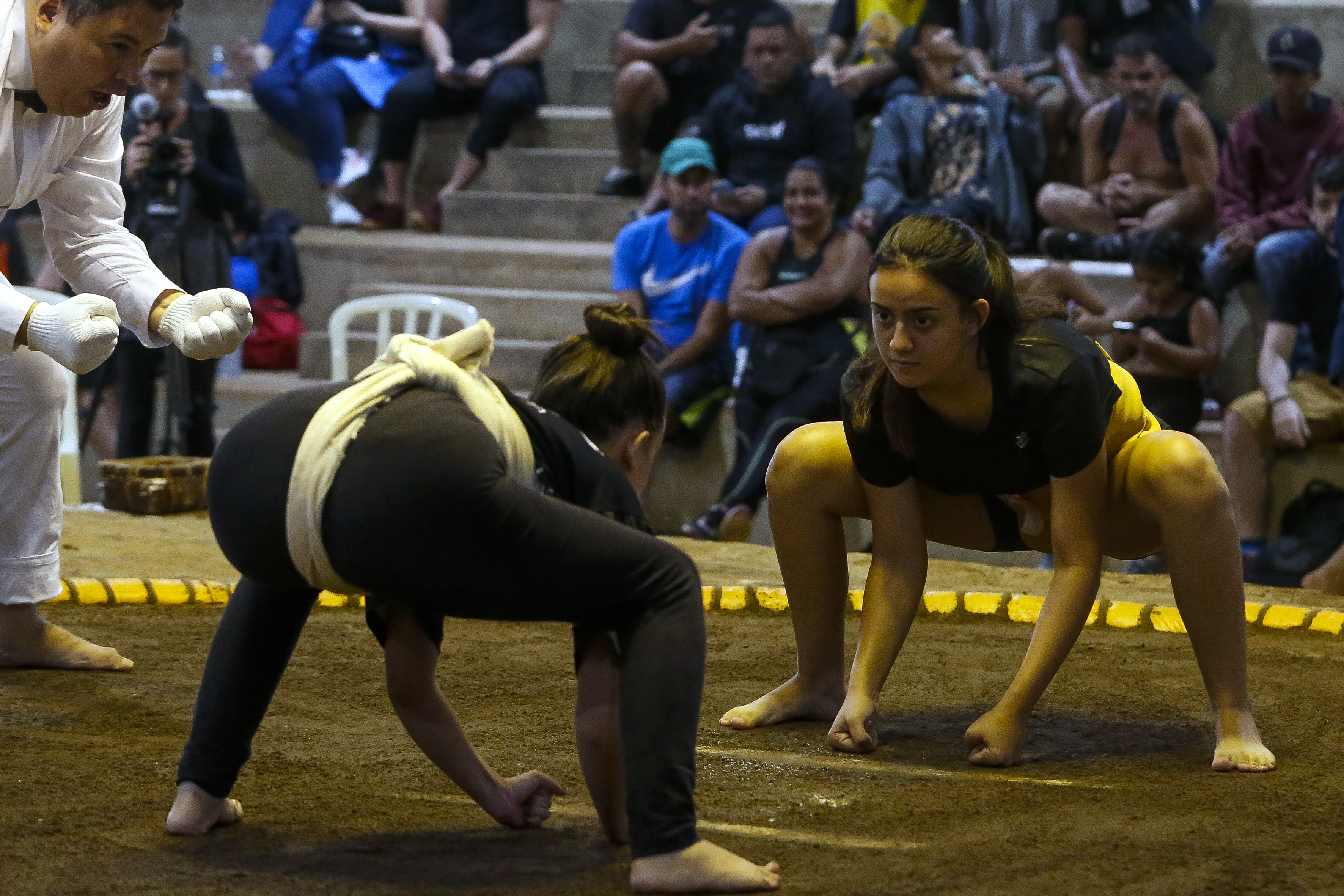 Sumo wrestlers fight during a Brazilian sumo championship bout, a qualifier for the South American championship, in Sao Paulo, Brazil