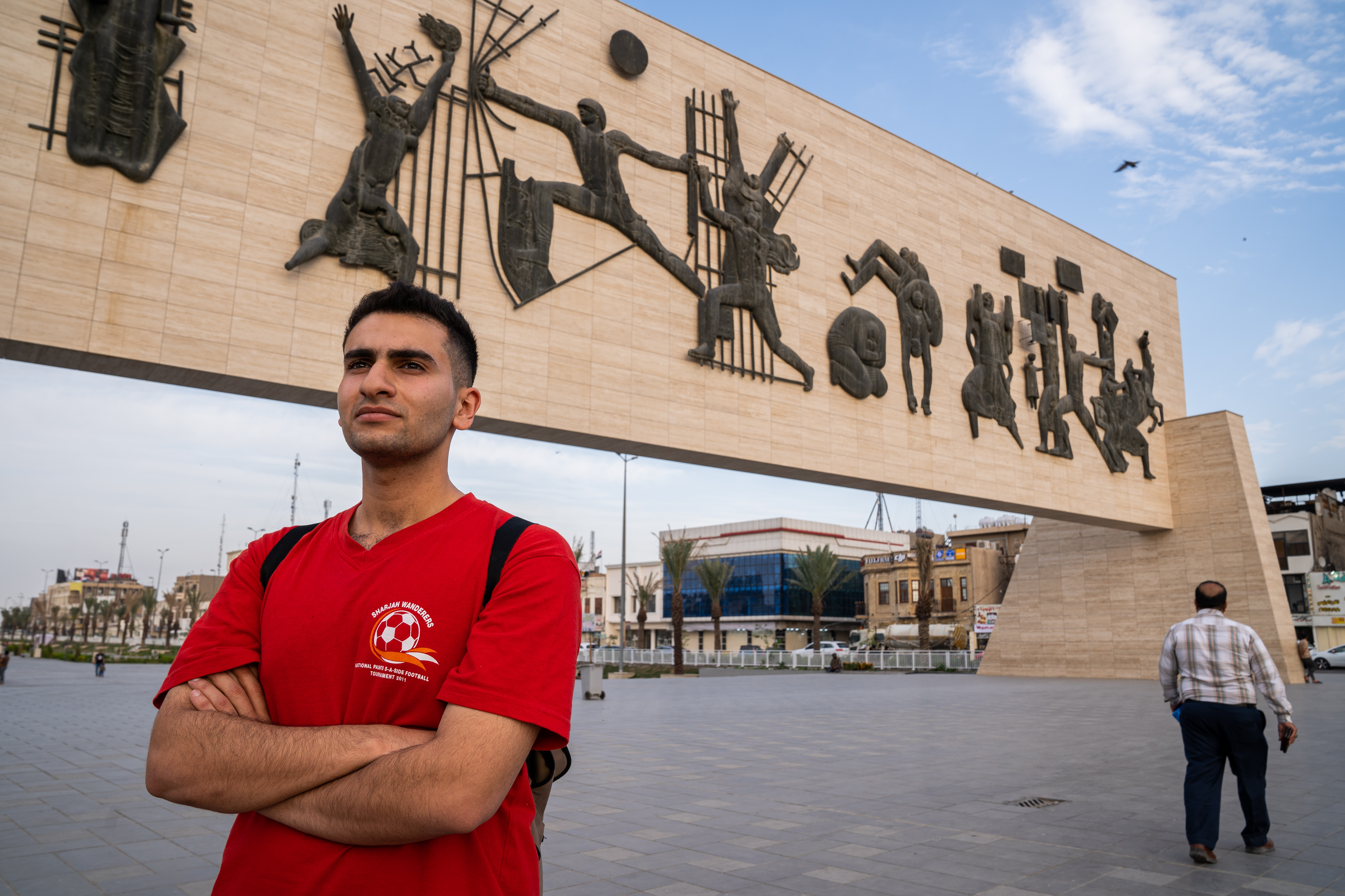 A photo of Yassin standing in Tahrir Square.