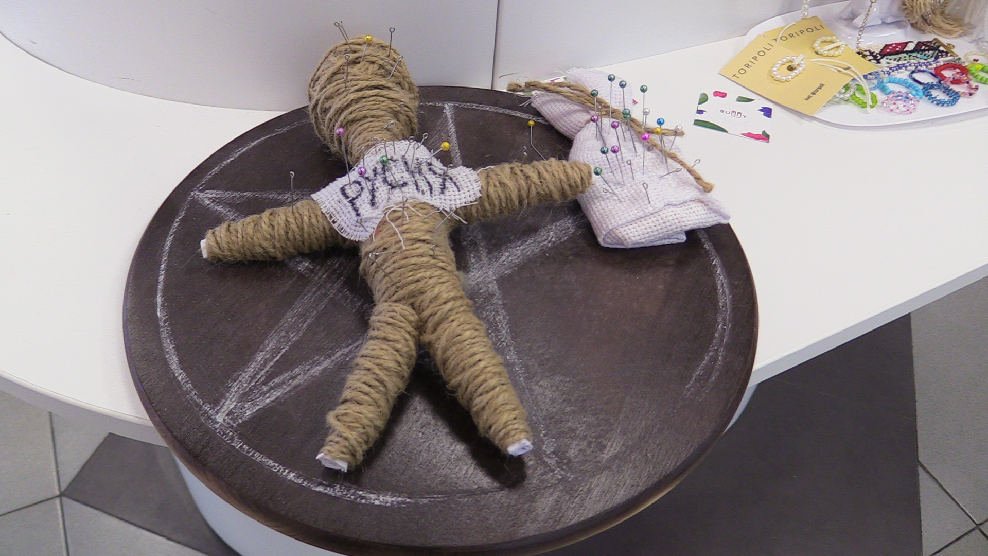 A voodoo doll depicting a Russian soldier in a Bunny Nails saloon in Kyiv