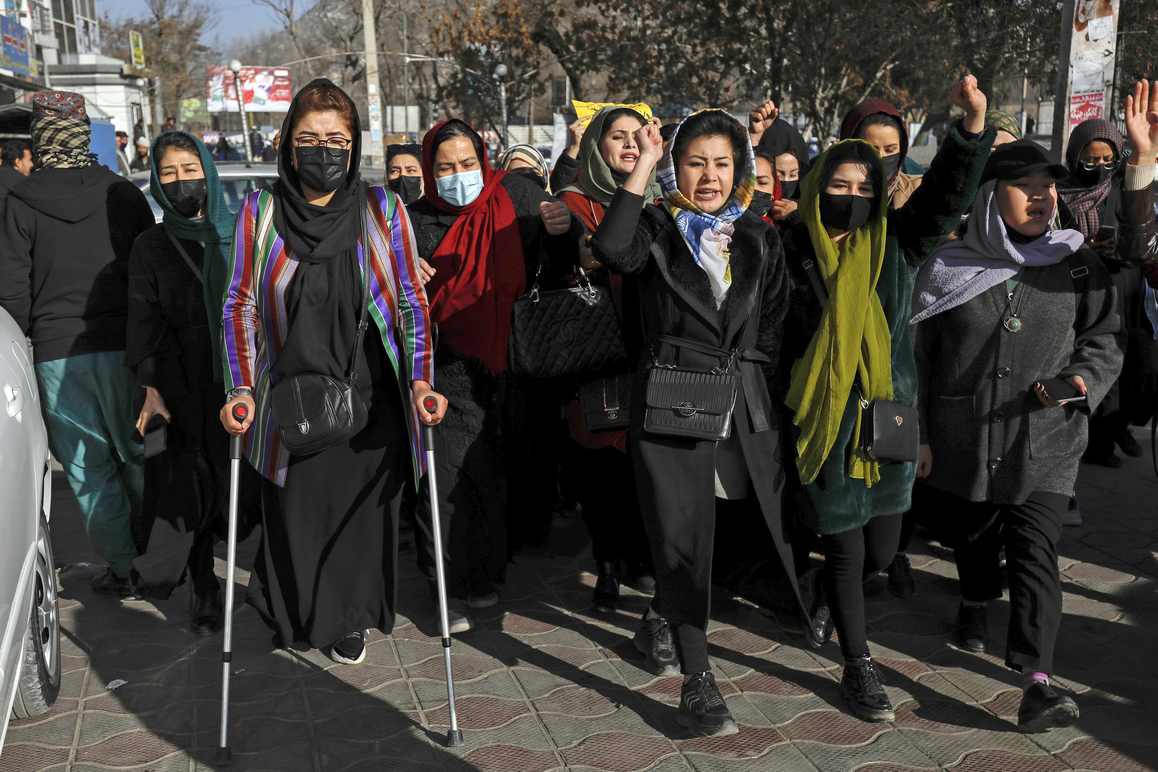 Afghan women chant slogans during a protest against the ban on university education for women, in Kabul, Afghanistan, Thursday, Dec. 22, 2022. (AP Photo)