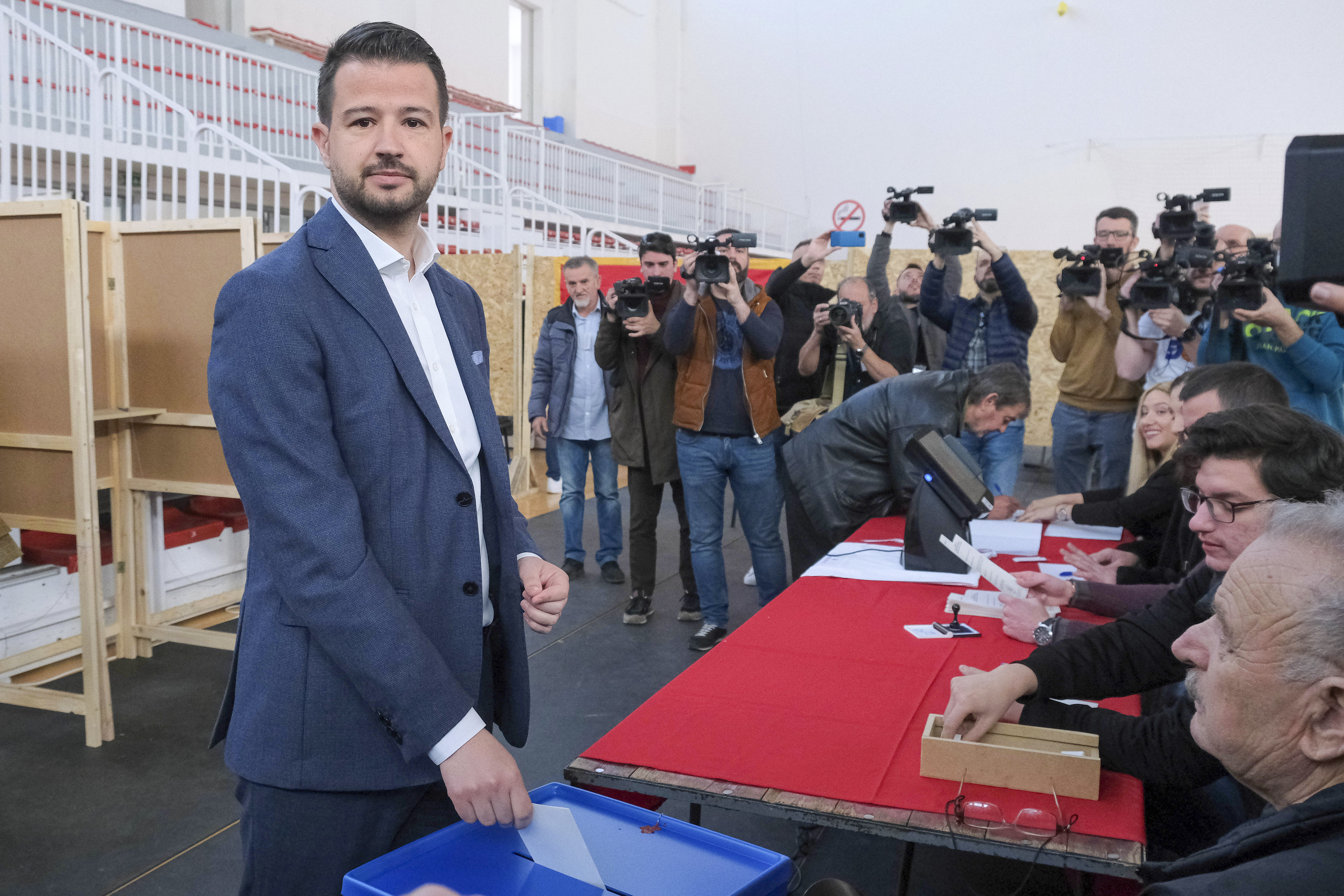 Economist Jakov Milatovic of the newly-formed Europe Now group casts his ballot at the polling station in Montenegro's capital Podgorica, Sunday, March 19, 2023. Voters in Montenegro are casting ballots Sunday in a presidential election marked by political turmoil and uncertainty over whether the small NATO member state in the Balkans will unblock its bid to join the European Union or seek to improve ties with Serbia and Russia. (AP Photo/Risto Bozovic)