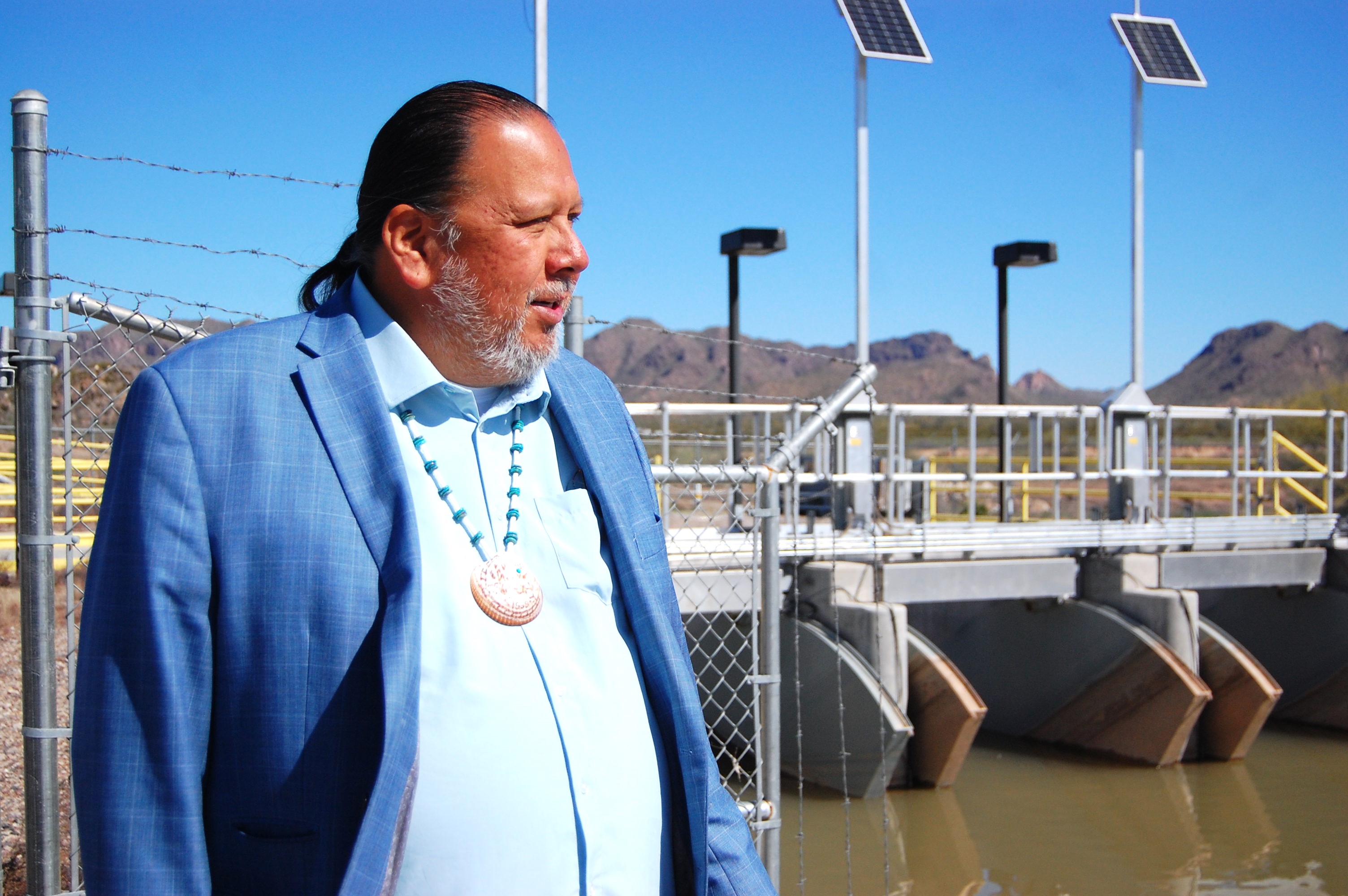 Gila River Indian Community Governor Stephen Lewis stands alongside a managed aquifer recharge site, in Gila River Indian Community, Arizona, US