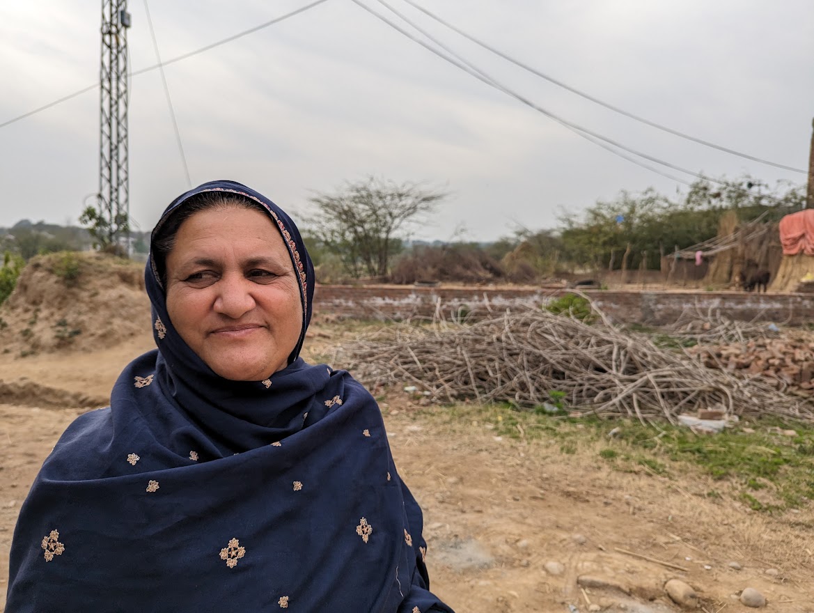 A photo of Zubeida walking through the village.