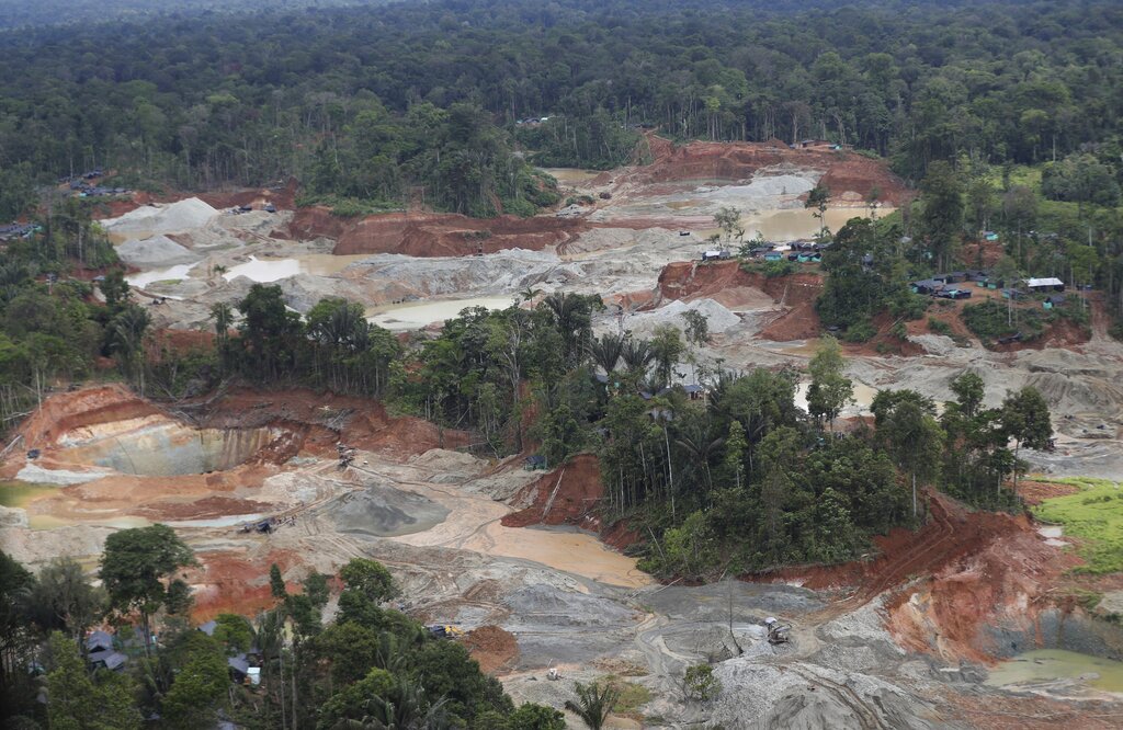 An illegal gold mine in Colombia surrounded by deforestation