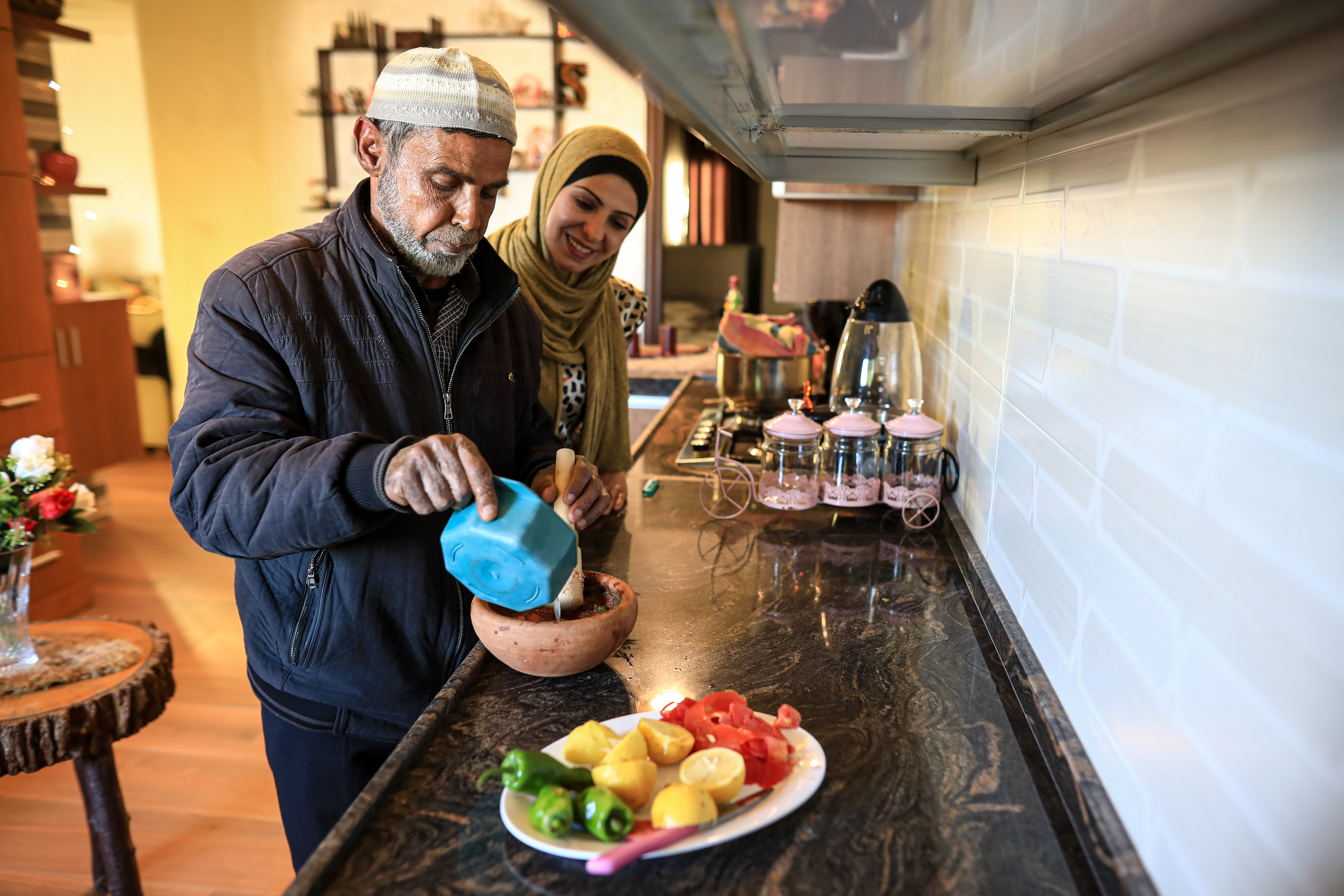 Siham's father prepares the