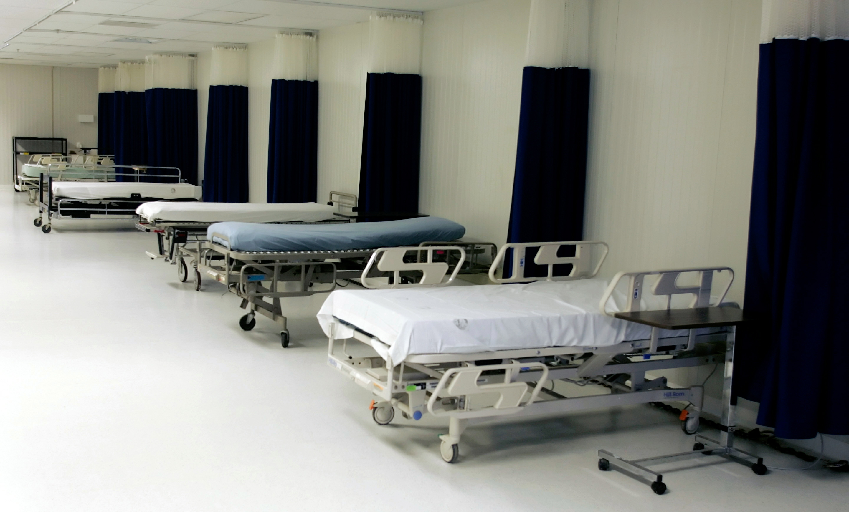 Hospital beds are seen at Camp Delta where some detainees have been tube-fed while participating in hunger strikes at the U.S. Naval Base Guantanamo Bay, Cuba in this January 18, 2006 file photo. [The United Nations ]committee against torture told the United States on May 19, 2006 it should close any secret prisons abroad and the Guantanamo Bay facility in Cuba, saying they violated international law.