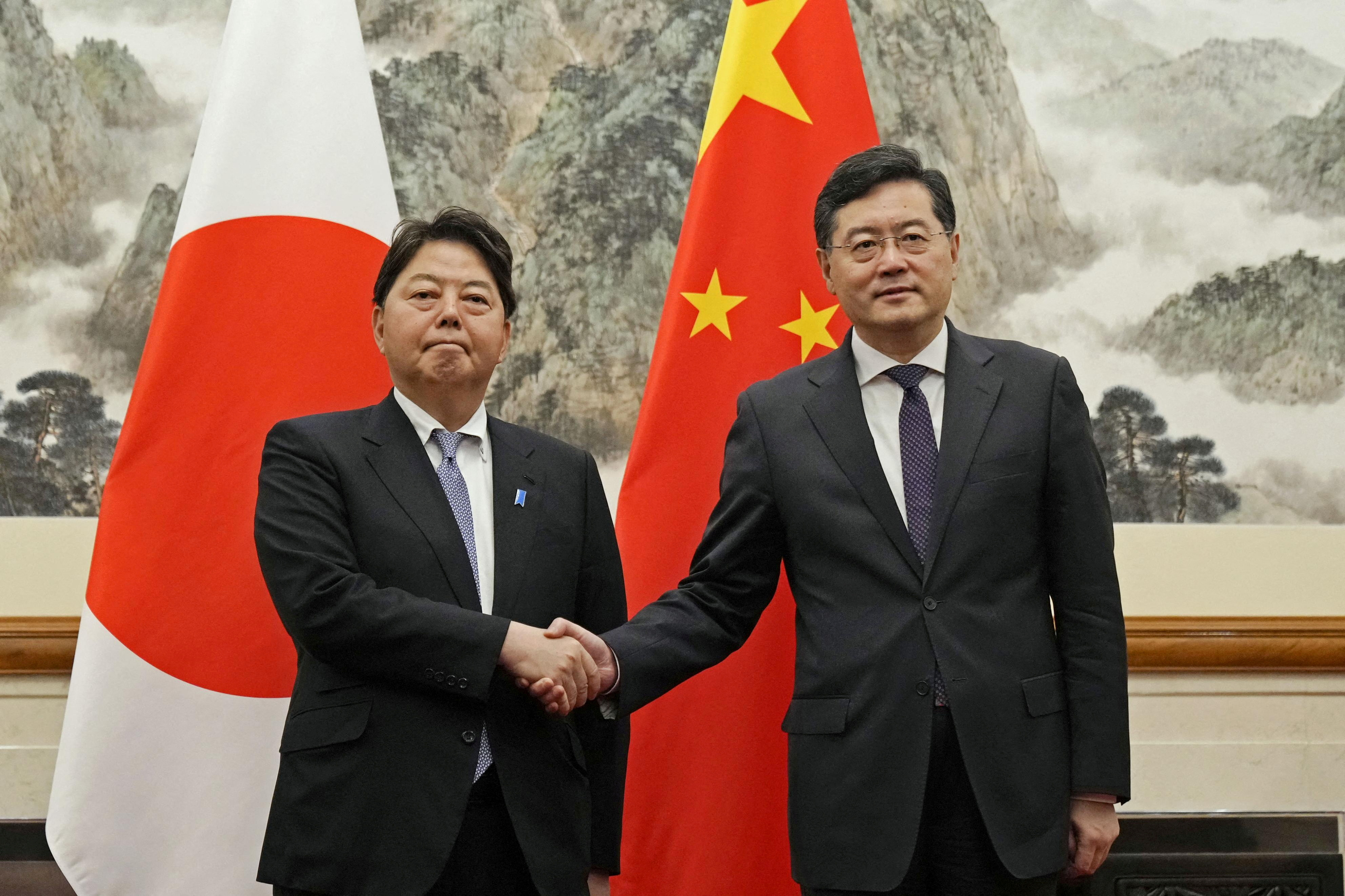 Japanese Foreign Minister Yoshimasa Hayashi, left, meets Chinese Foreign Minister Qin Gang