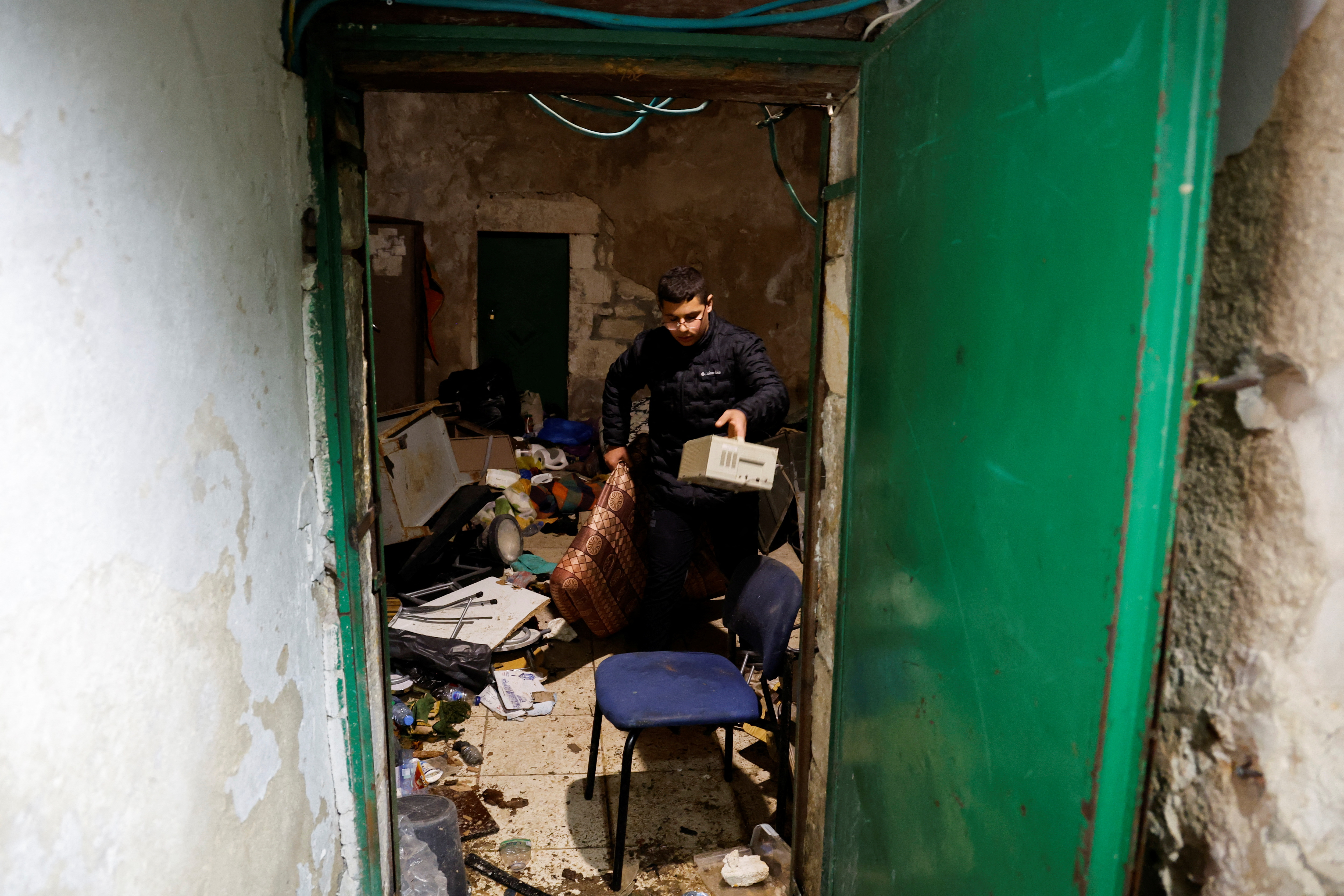 A man cleans inside the Al-Aqsa compound
