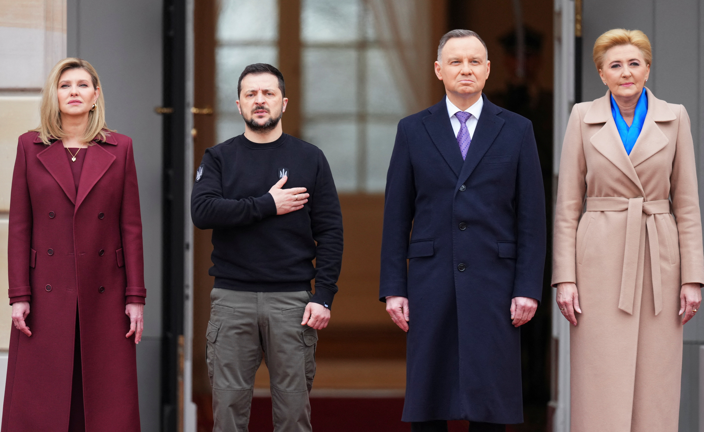 Poland's President Andrzej Duda, first lady Agata Kornhauser-Duda, Ukrainian President Volodymyr Zelenskiy and first lady Olena Zelenska meet at the Presidential Palace in Warsaw, Poland.