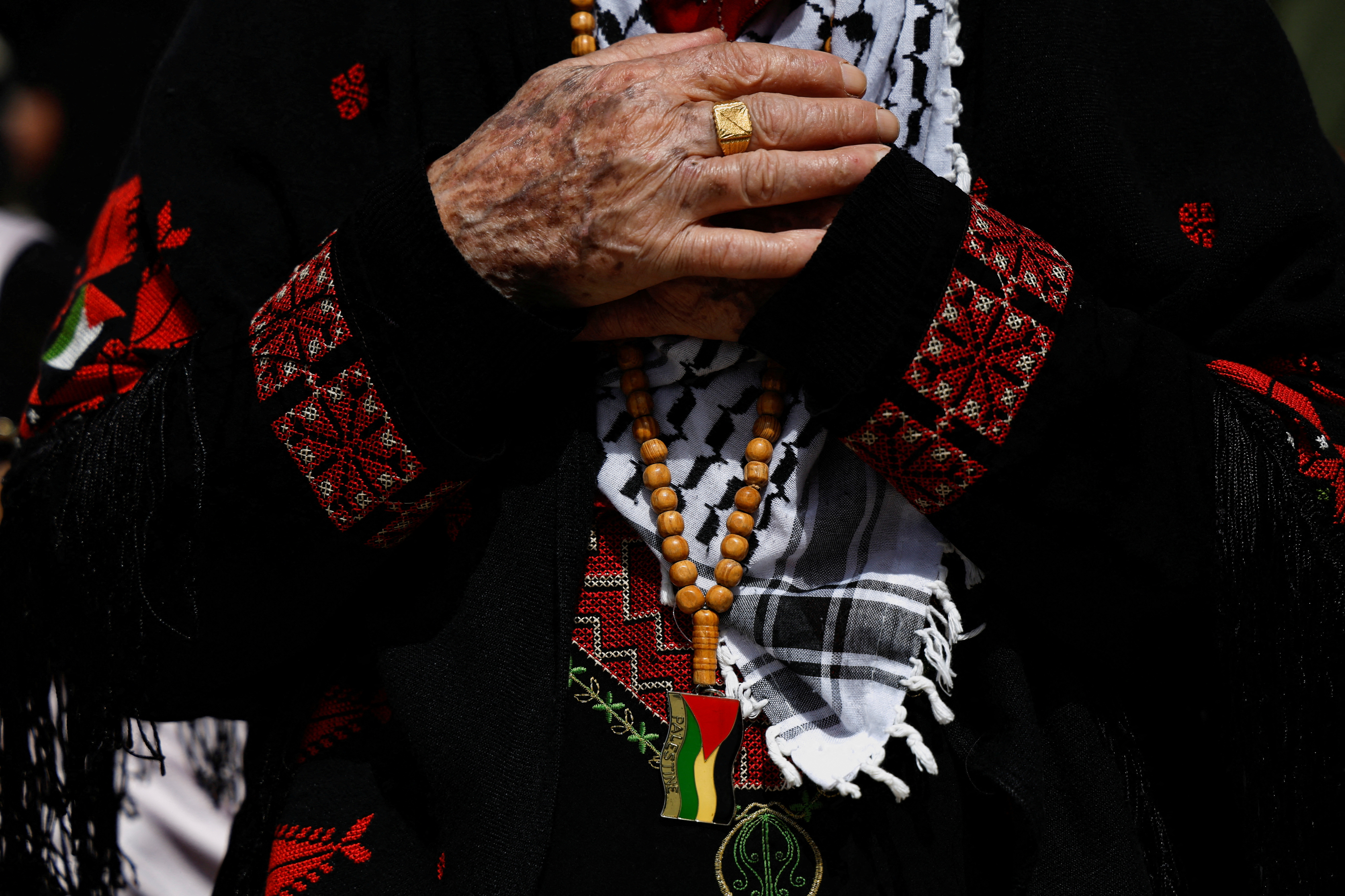 A person prays as Palestinian Muslims attend Friday prayers of the Muslim holy month of Ramadan.