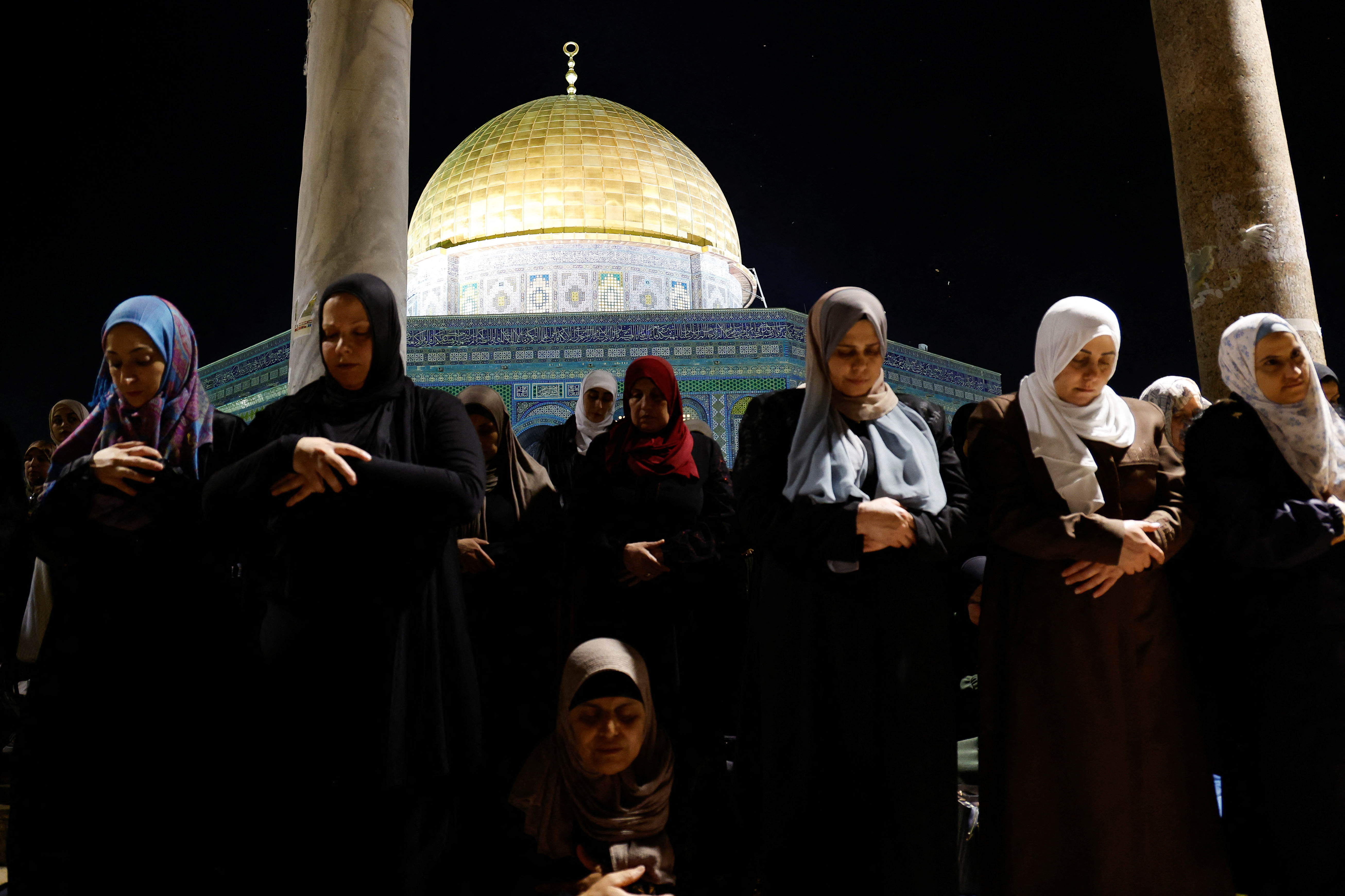 Palestinians pray on the Laylat al-Qadr