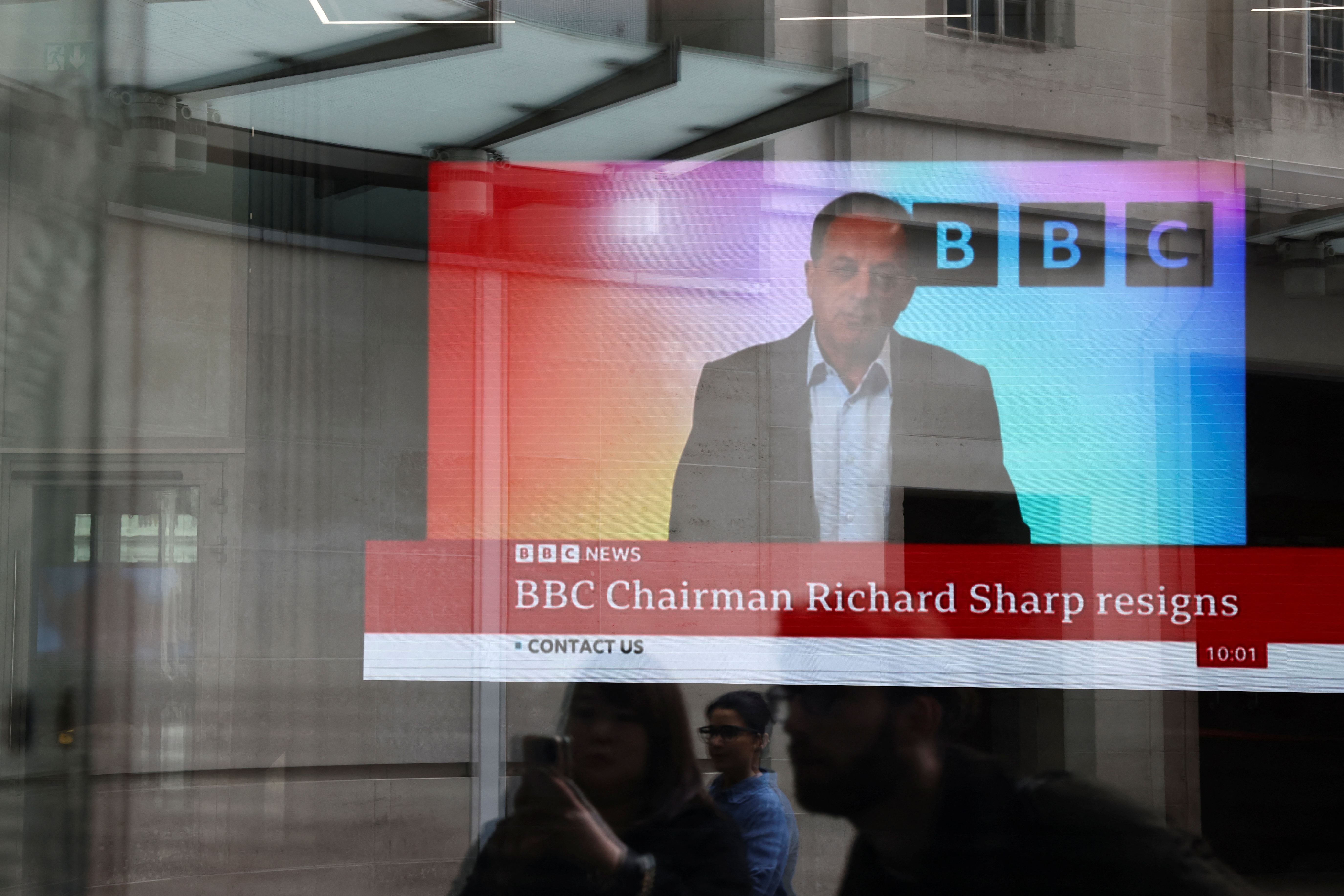 A screen inside BBC headquarters broadcasts a statement by Richard Sharp following his resignation, in London, Britain April 28, 2023. REUTERS/Henry Nicholls