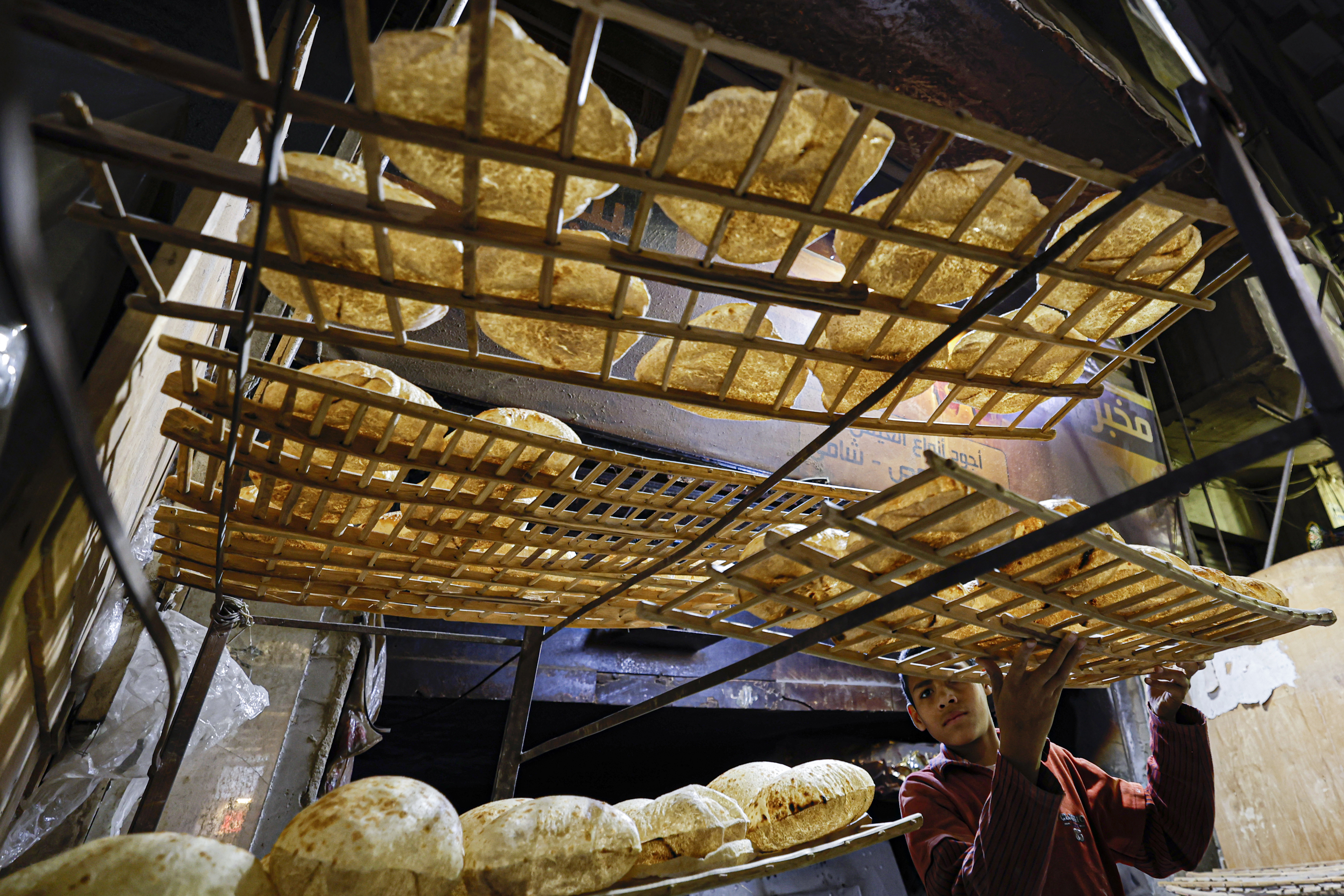 trays of freshly-baked bread at a bakery