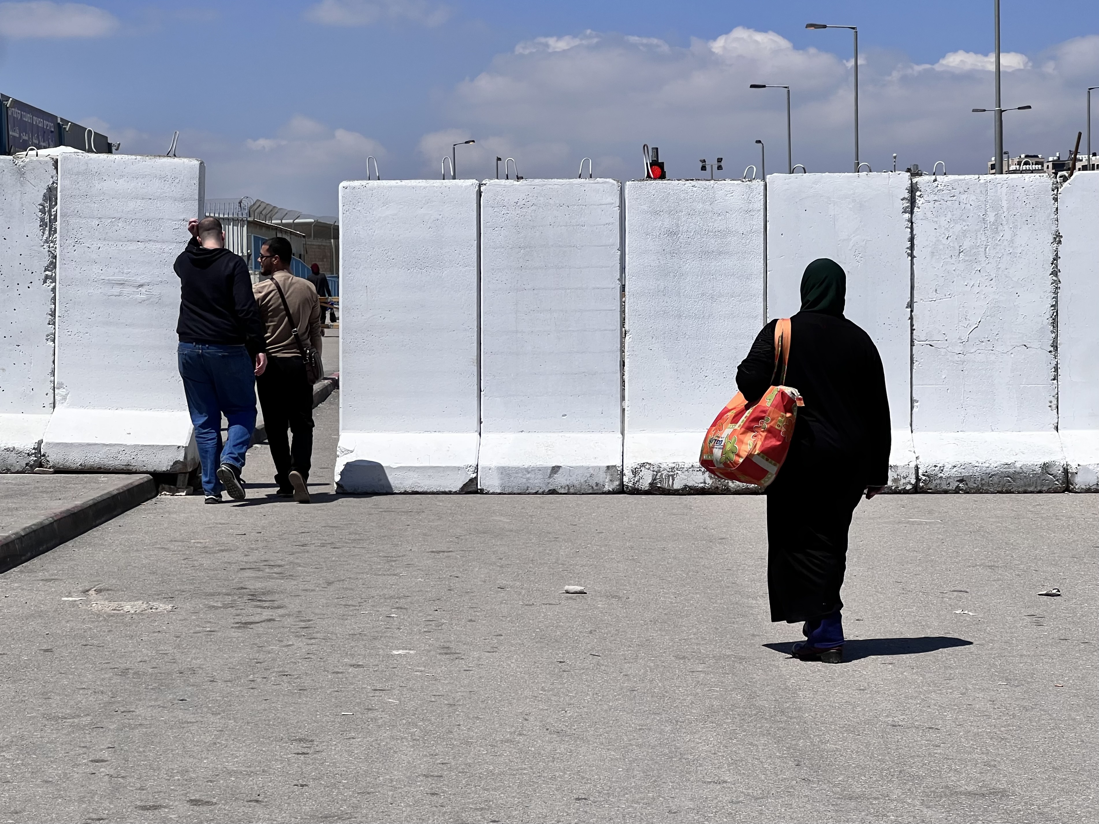 Palestinians enter the Qalandiya checkpoint on the fourth (and possibly last) Friday of Ramadan.