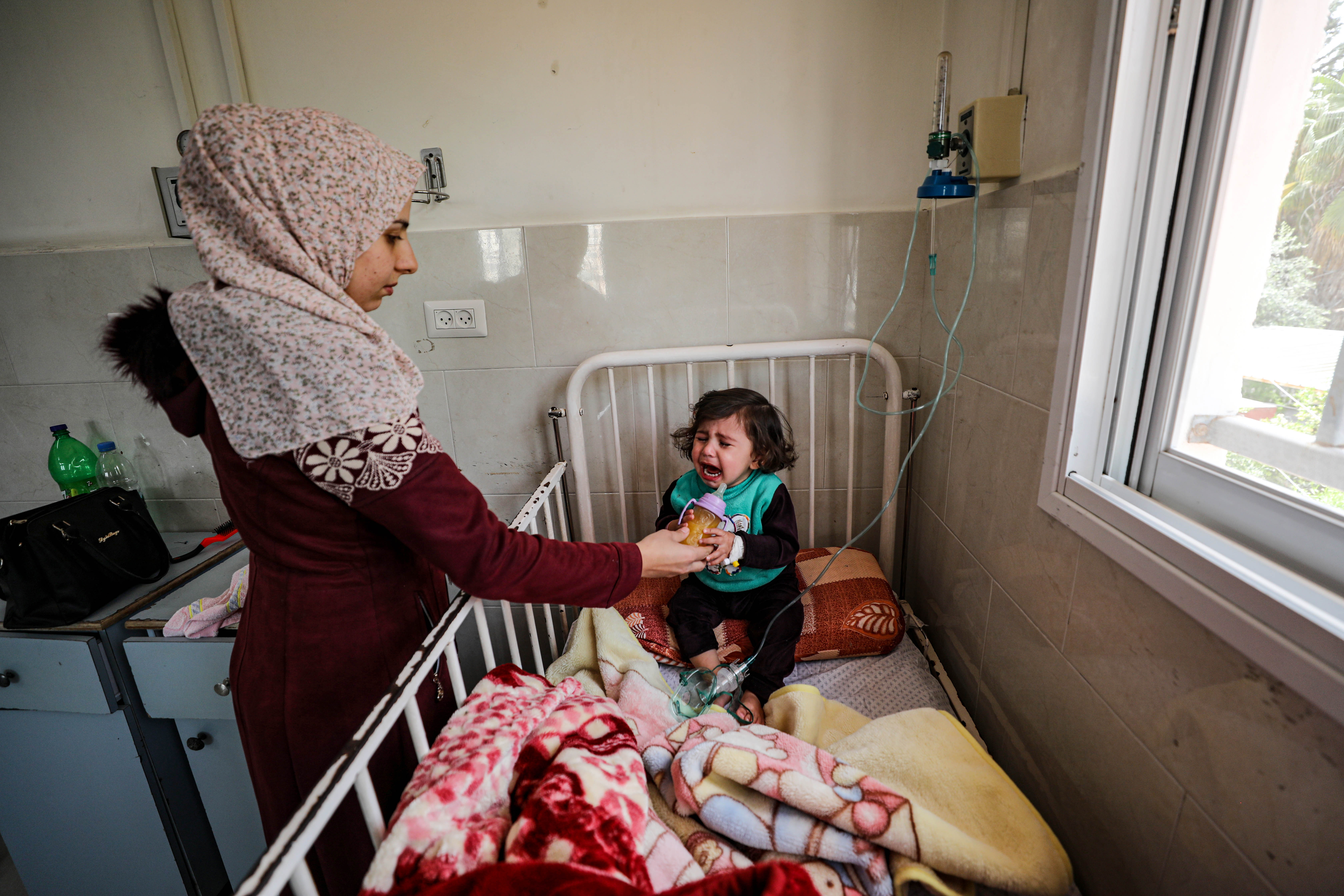 A mum reassuring her baby.